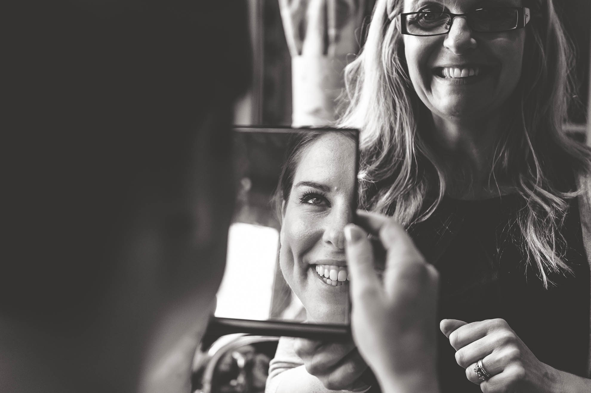 Bridemaids reflection in mirror