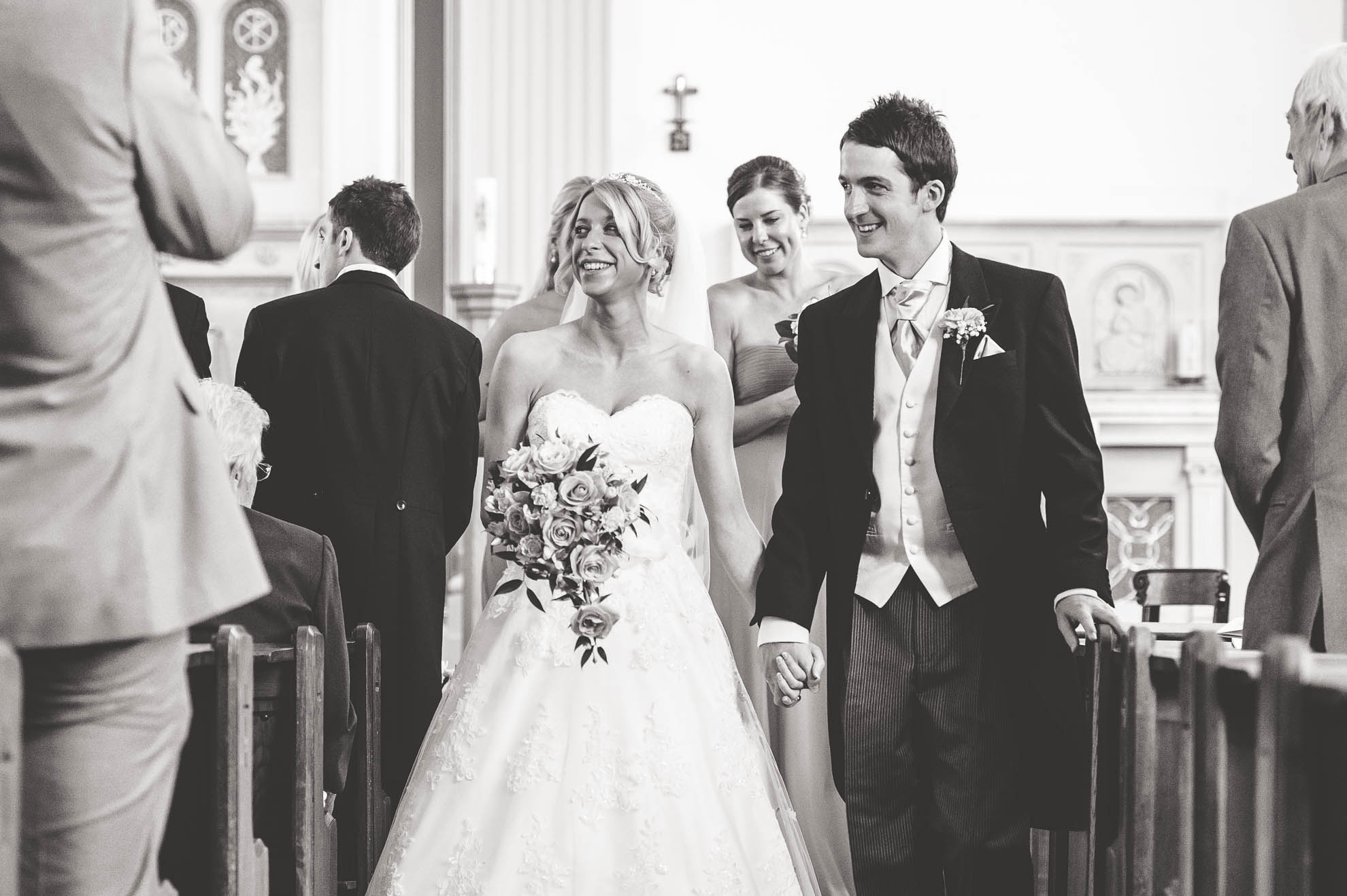 The newlyweds walk back down the aisle