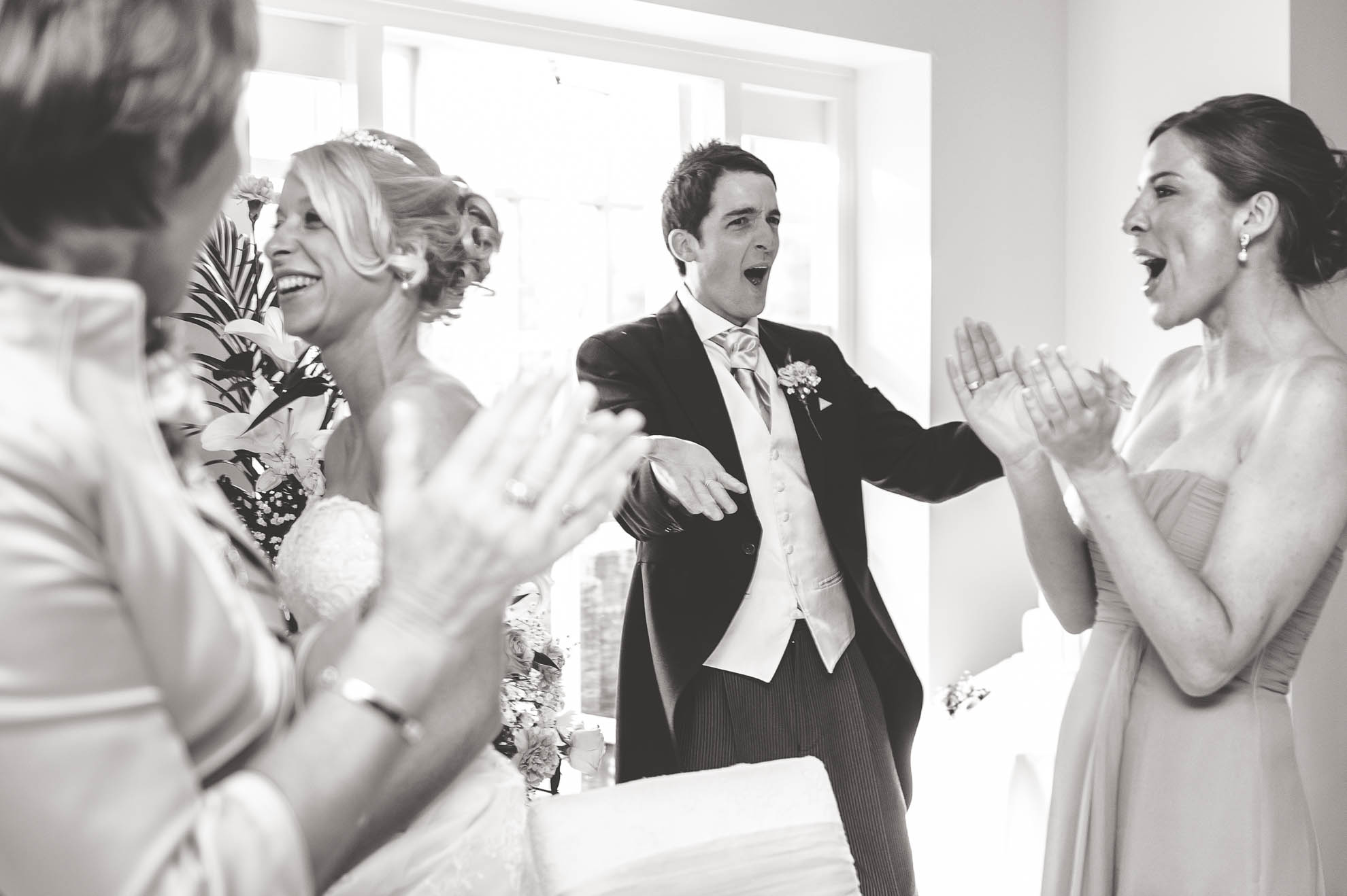 Bride and groom enter the wedding breakfast