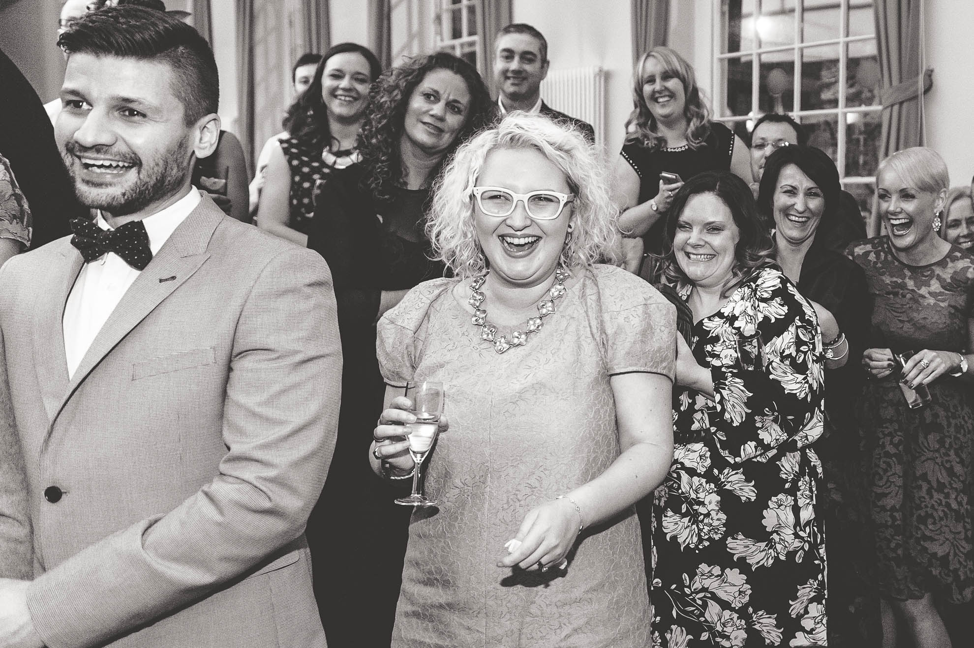 guests laugh during speeches
