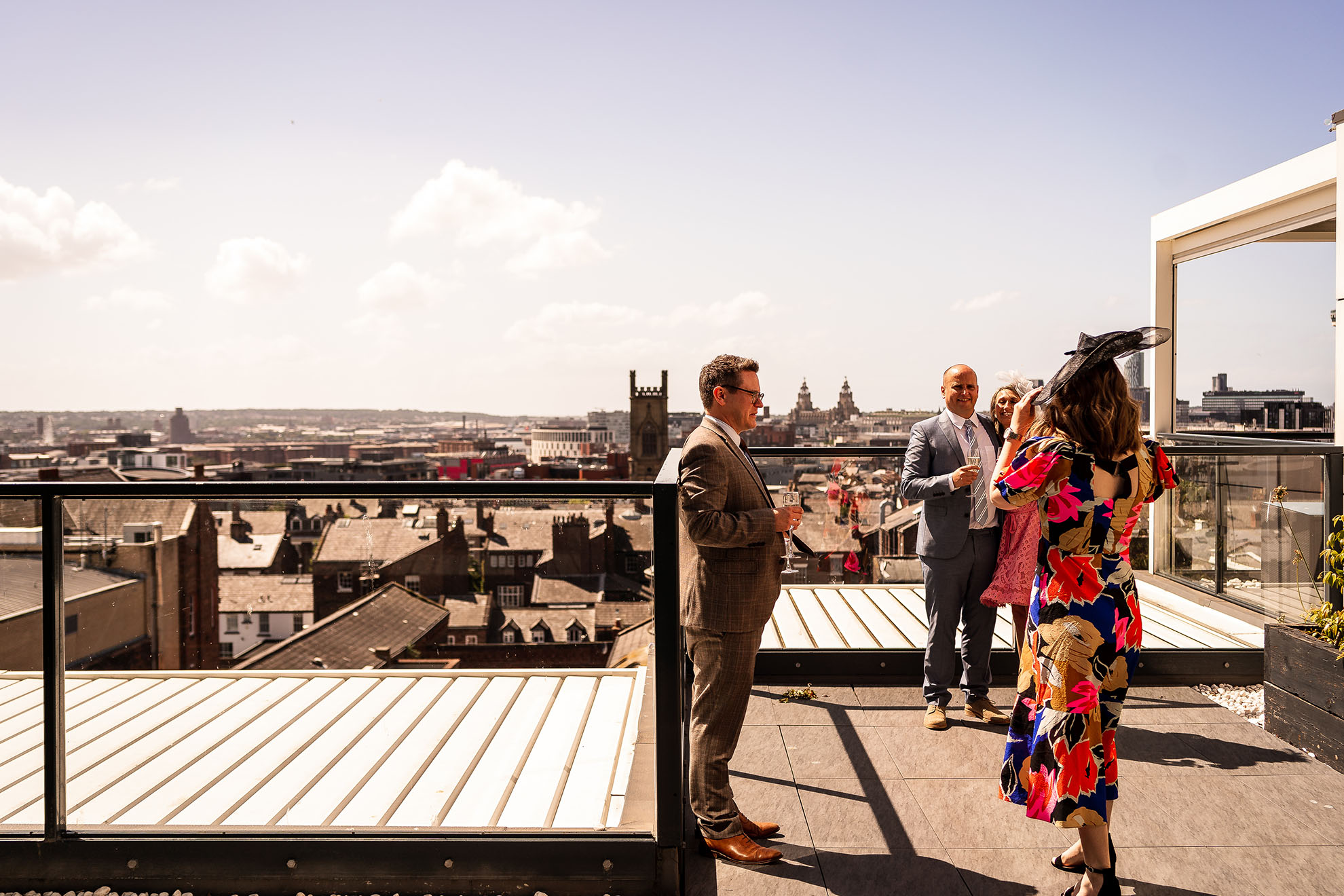 Weddin guests on Hope street Hotel terrace