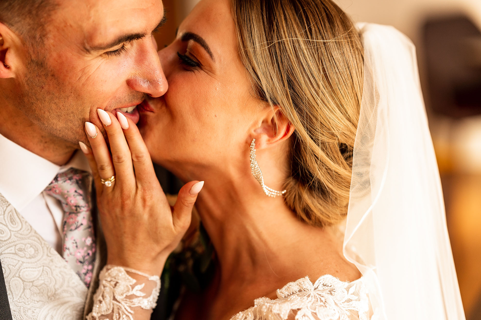 Bride kisses groom