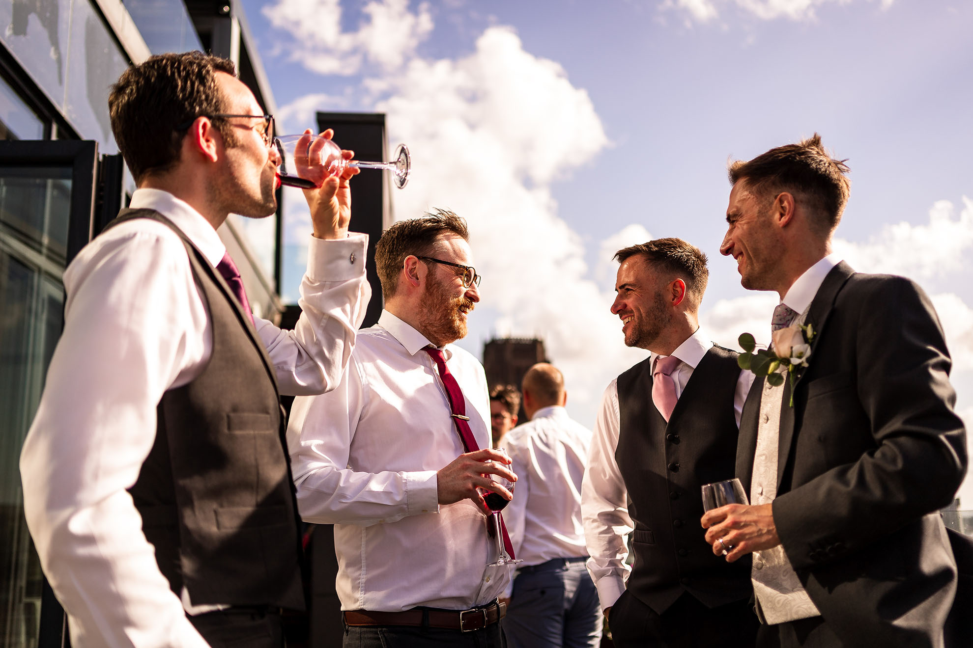 Groom sharea a joke with guests