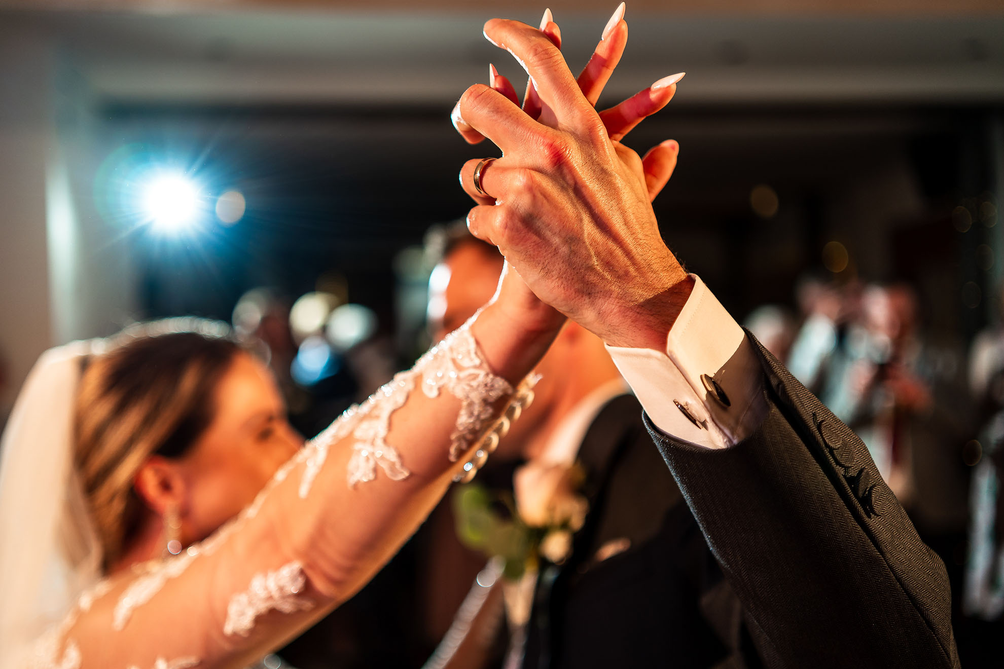 Bride and groom holding hands