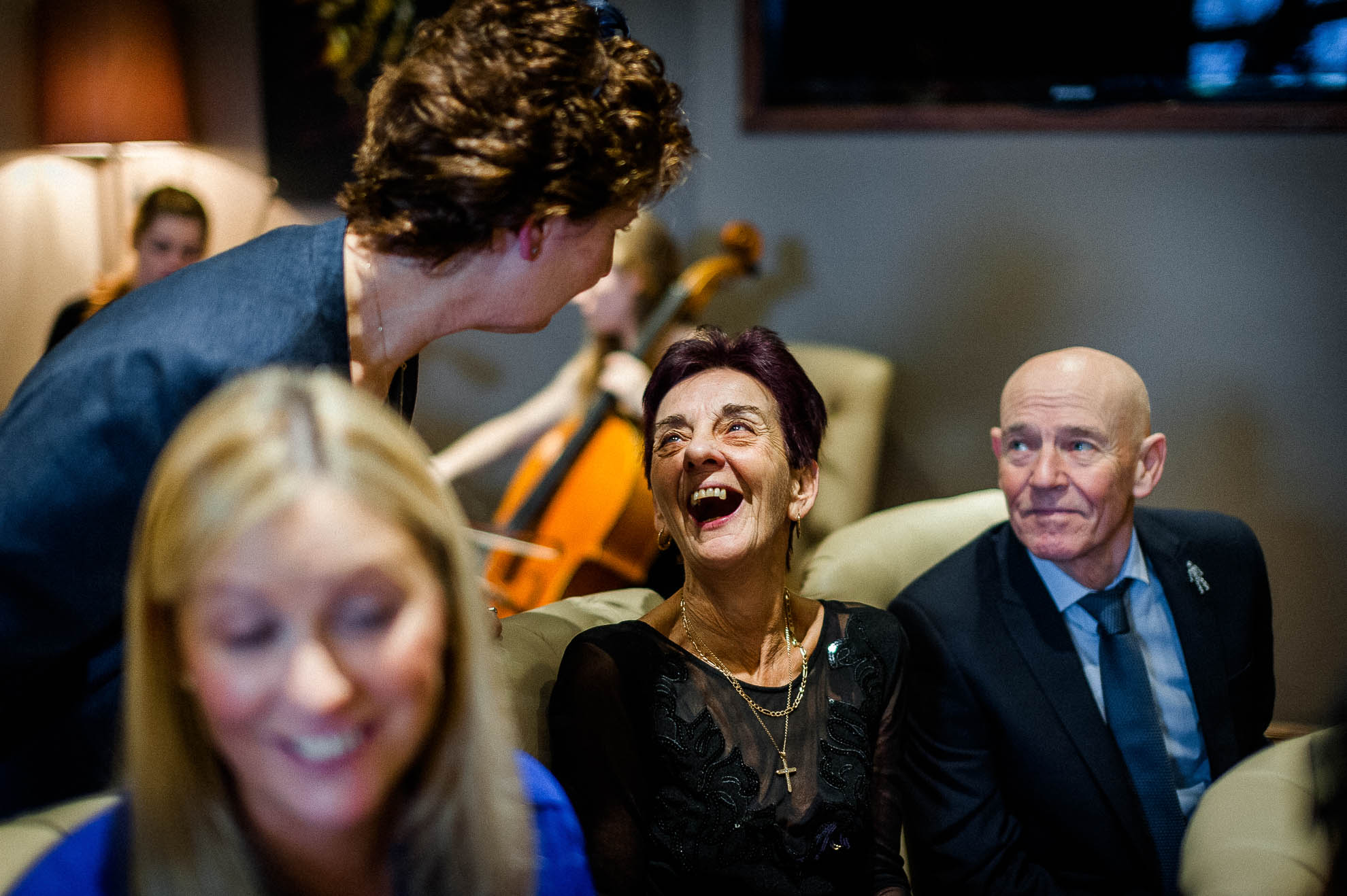 Guests sharing a joke in the ceremony room