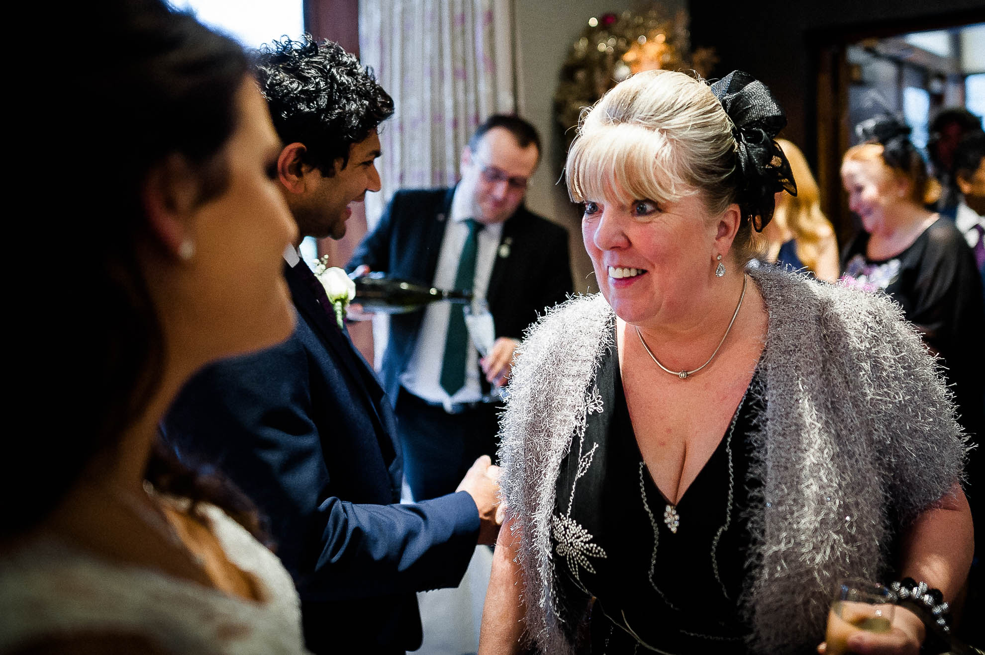 Weeding guest congratulates the bride