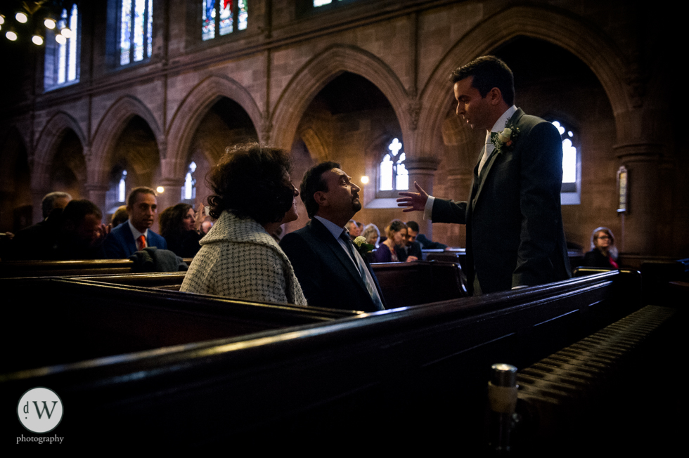 Groom chatting to his parents