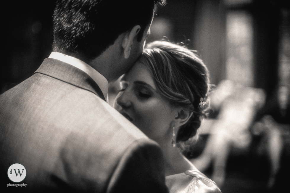 Bride and groom dancing together close up