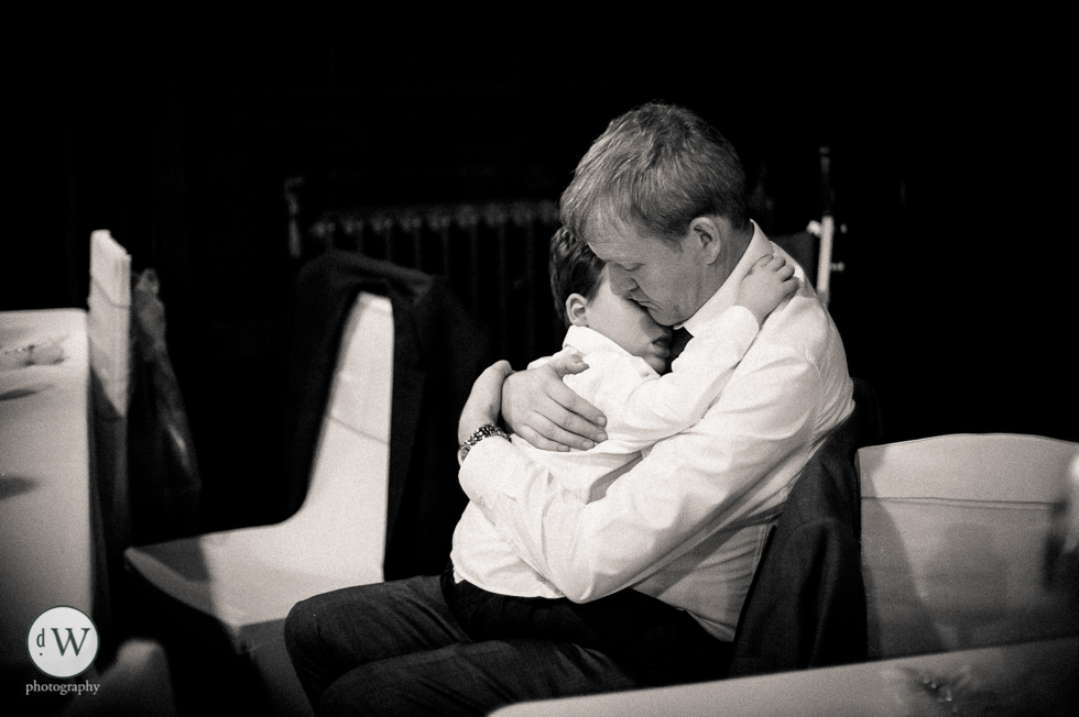 Father holds son 