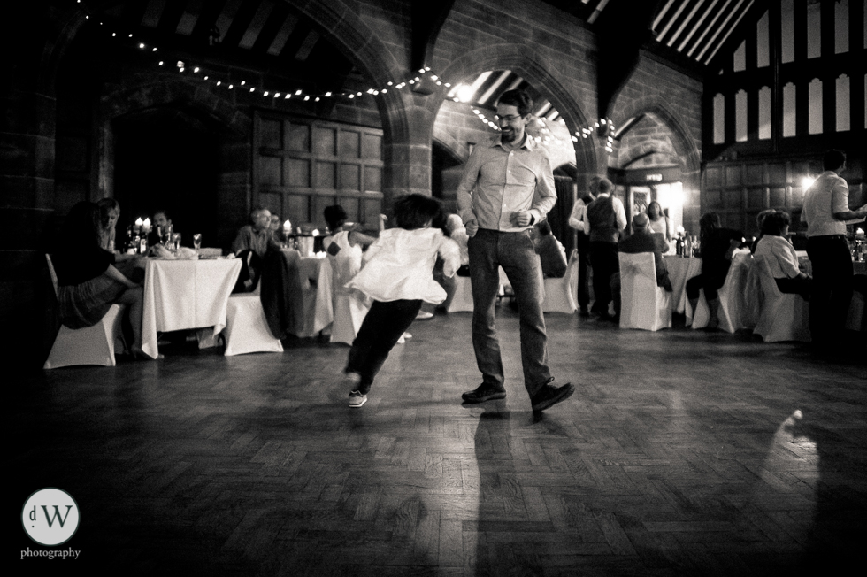 Little boy dancing with father