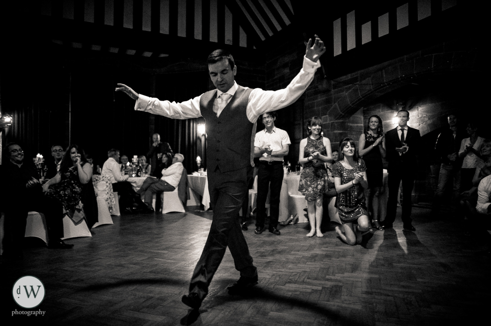 Groom greek dancing