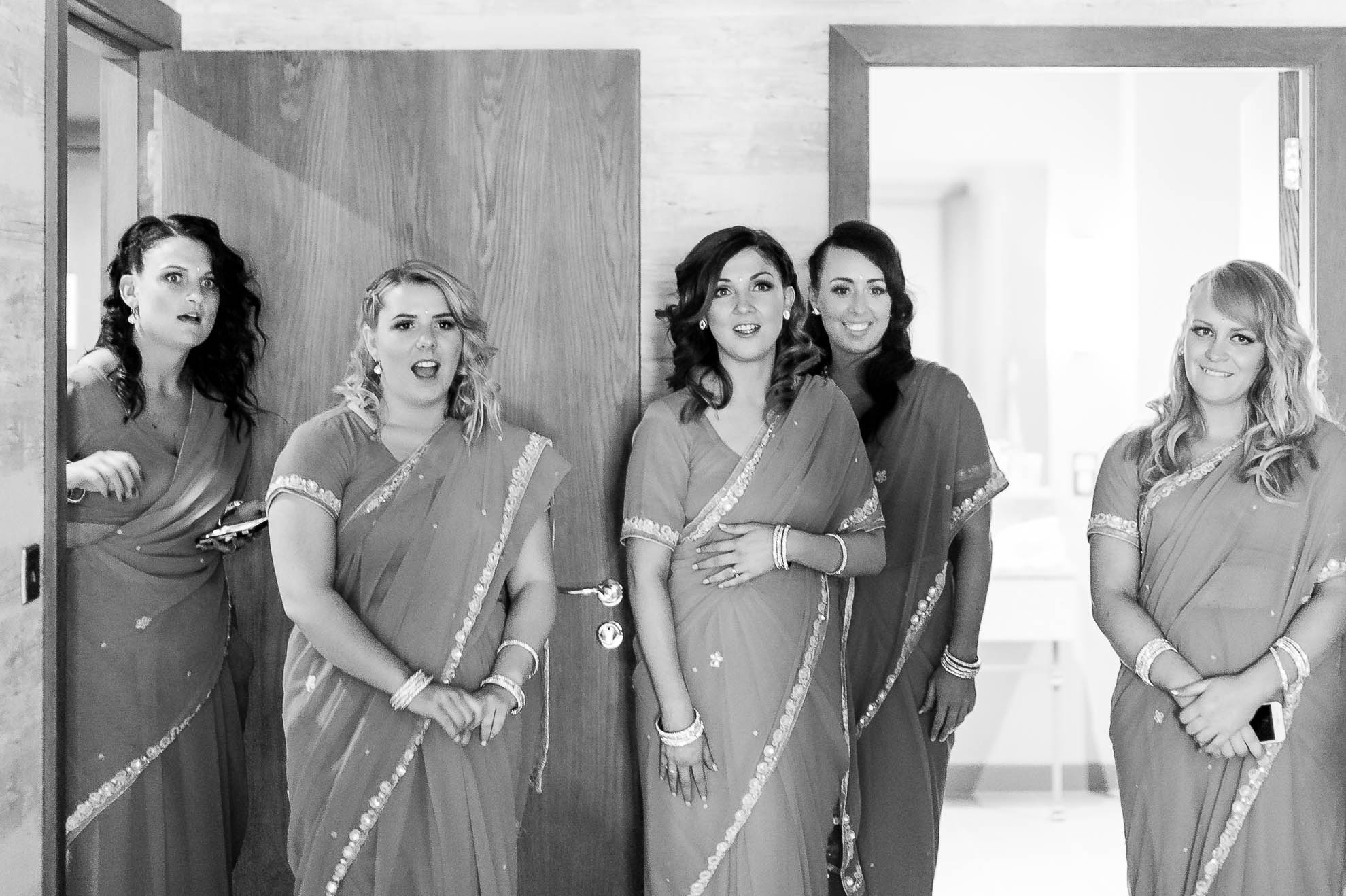 bridesmaids see the wedding dress for the first time