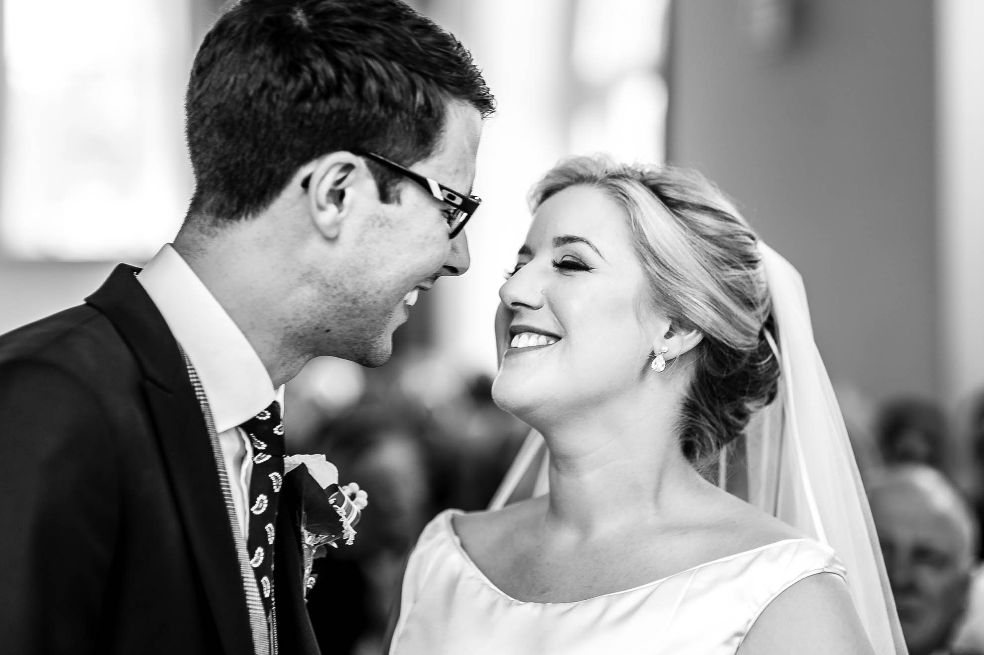 Bride and groom smile after being announced married