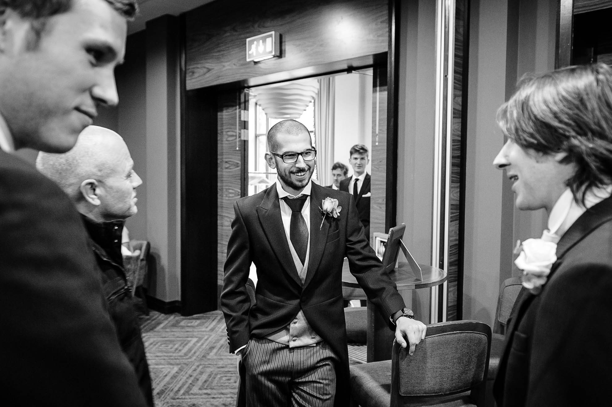 Groom and groomsmen share a joke