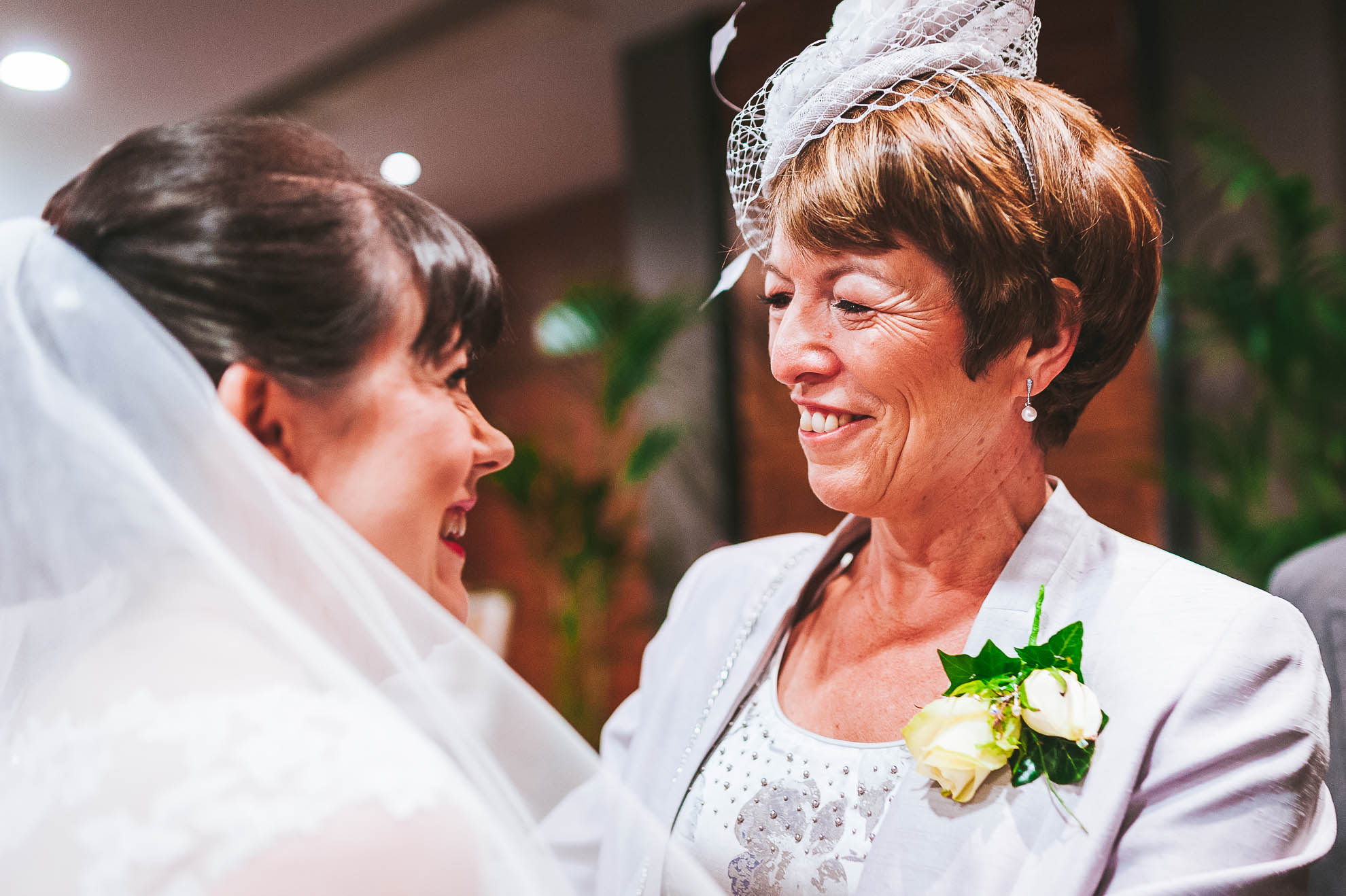 Mother of the groom congratulates the bride