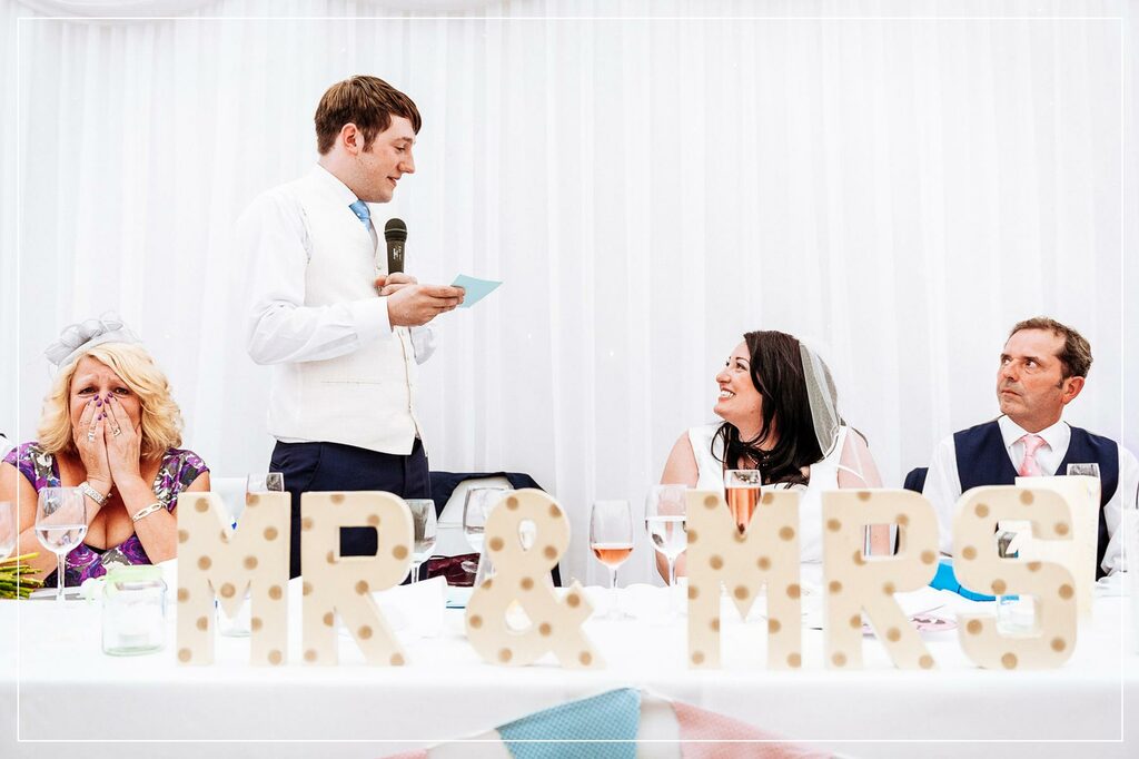 groom tells his bride how much he loves her
