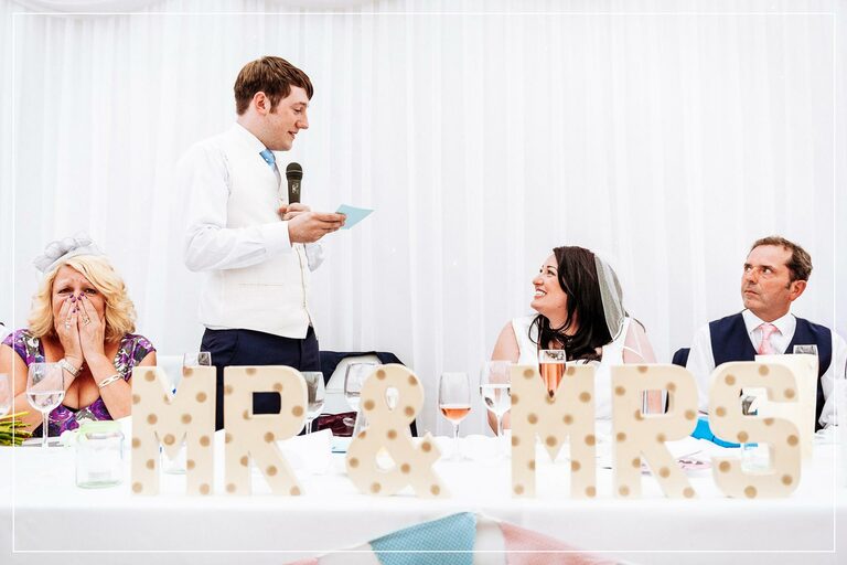 groom tells his bride how much he loves her