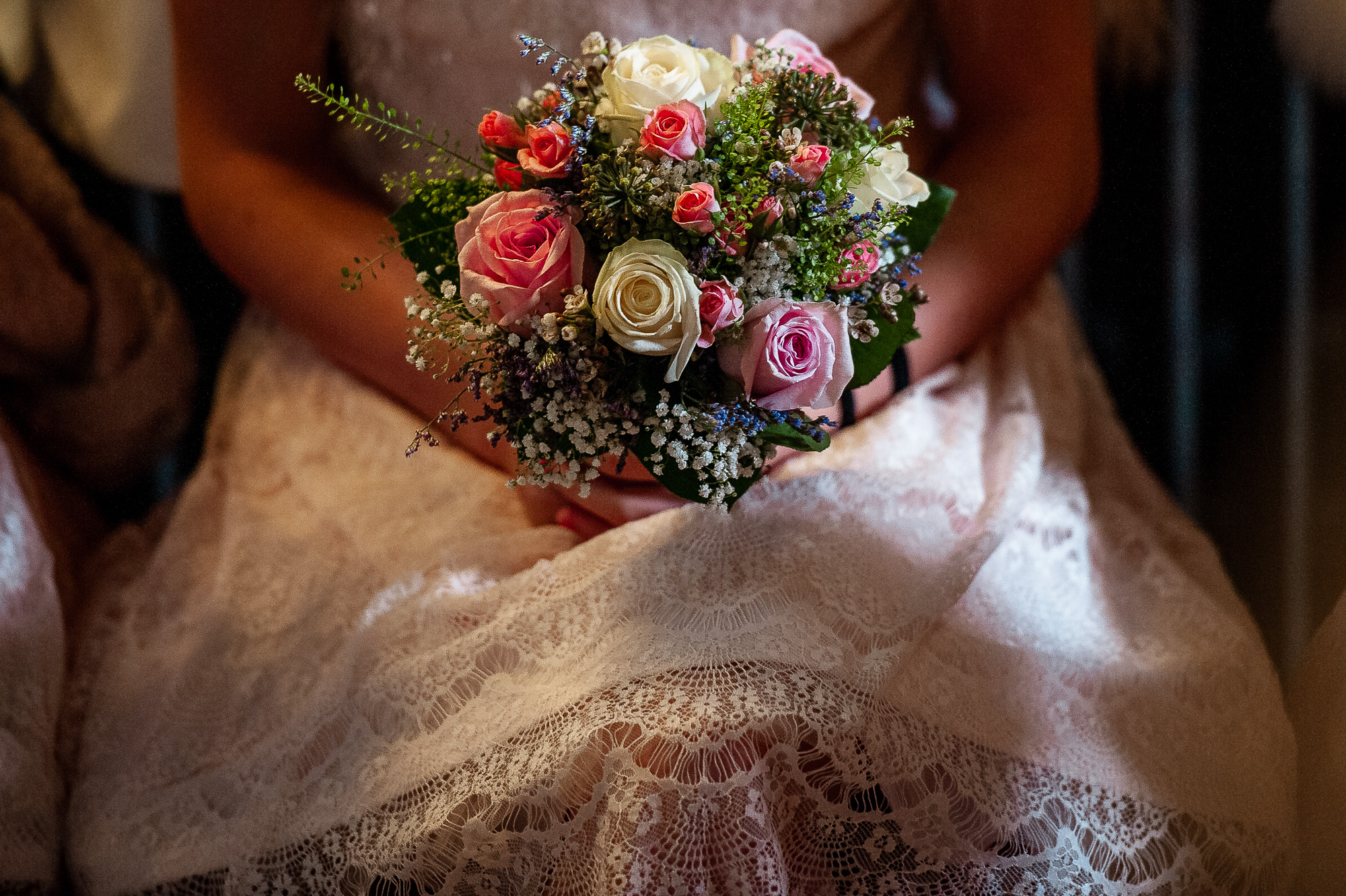 Close up of bridesmaid holding her boquet