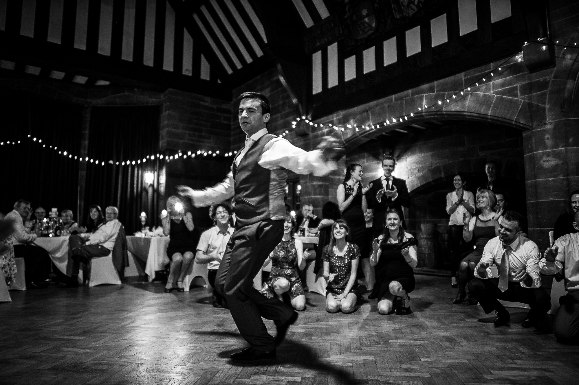 The groom performs a special greek wedding dance 