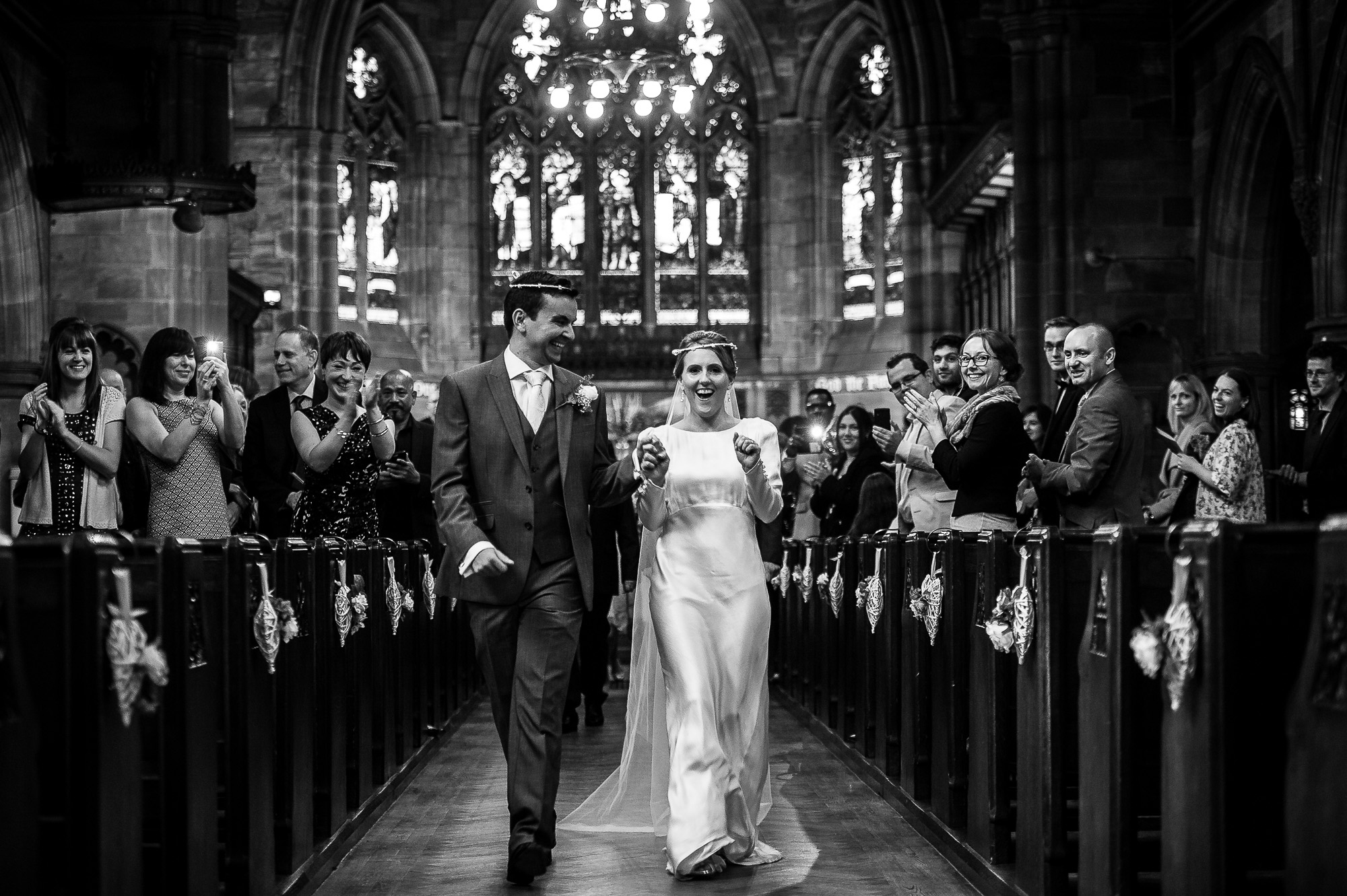 The newlyweds walk back down the aisle