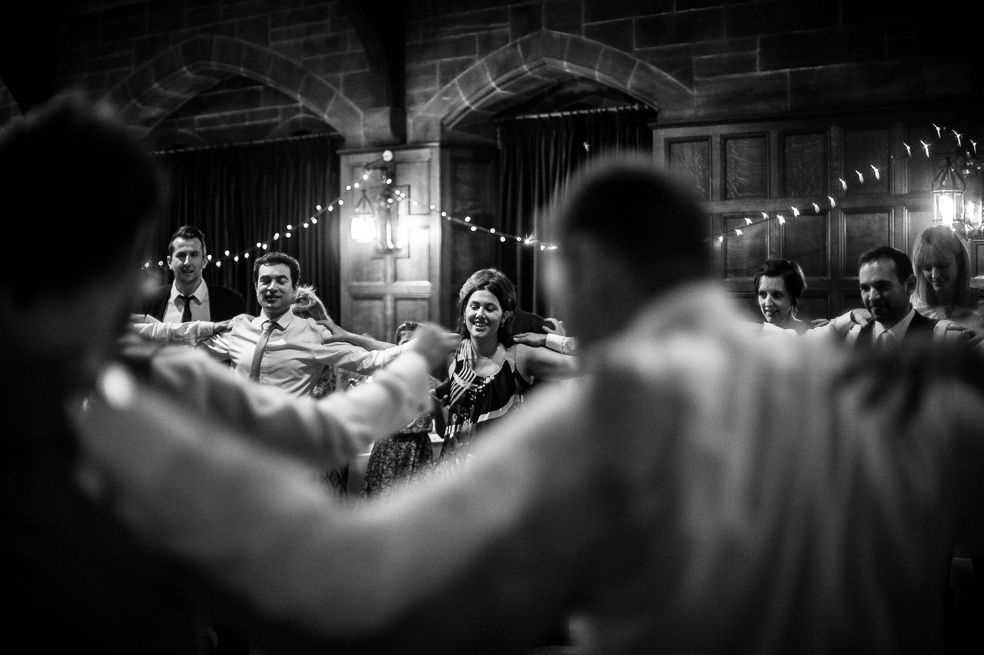 Guests join in for some fun greek dancing at the evening reception