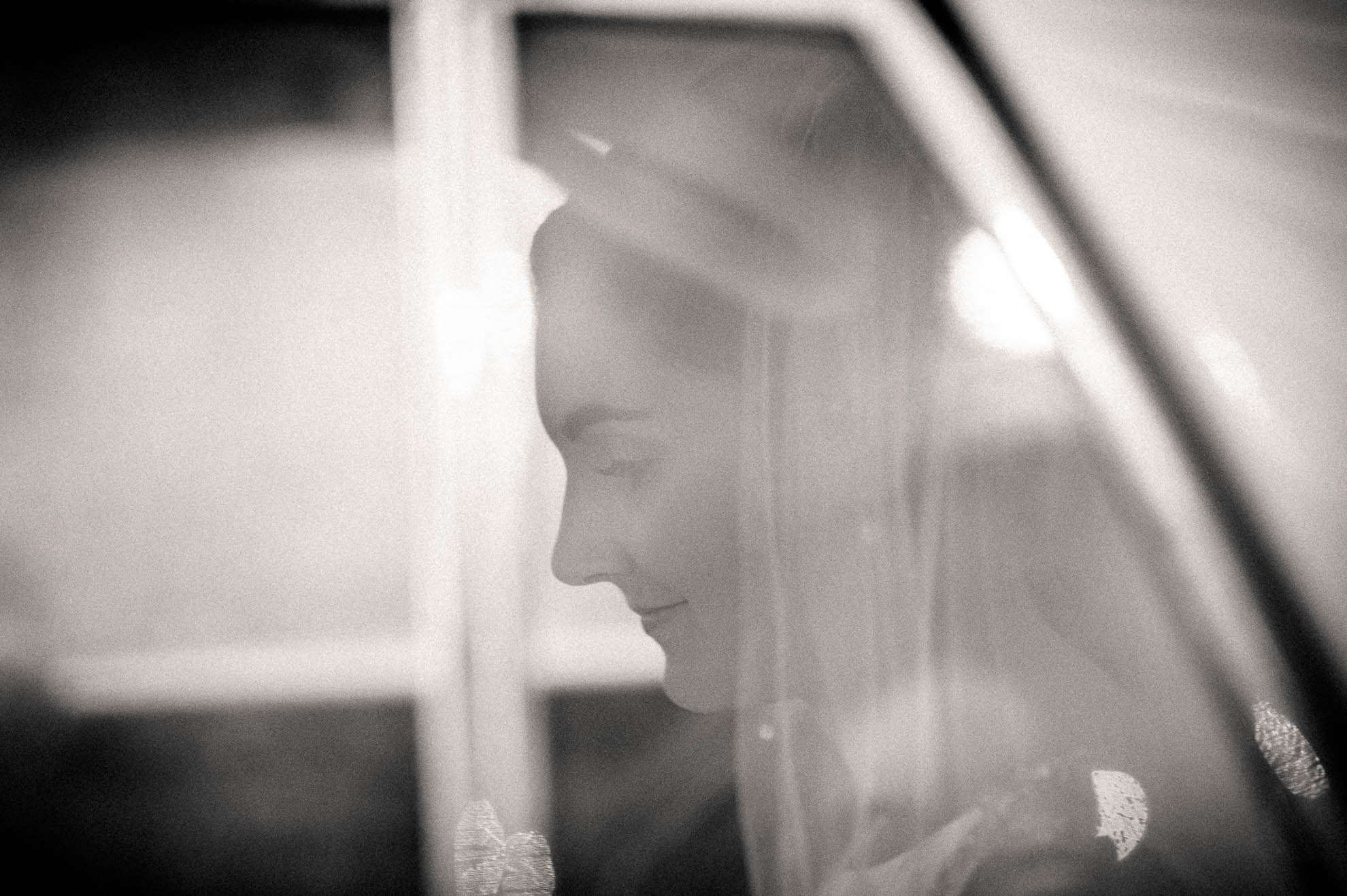 bride in car arriving at church