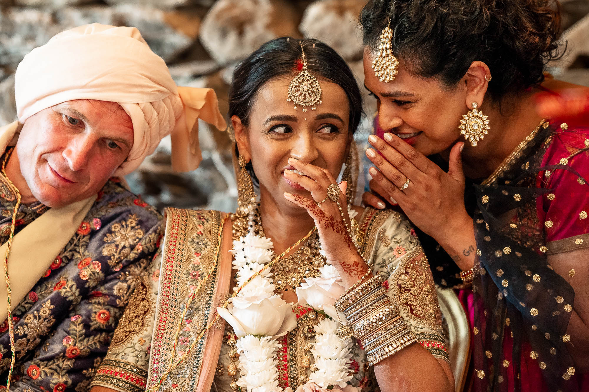 A bridesmaid tells the bride a joke