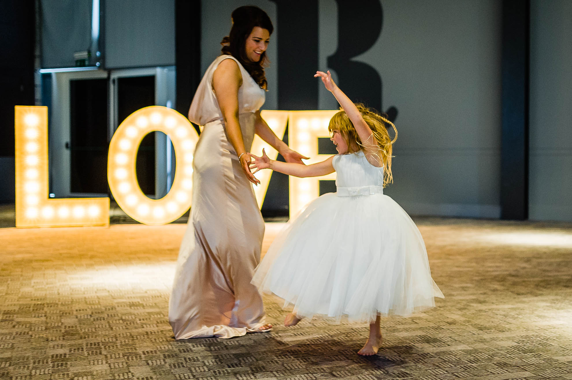 A flower girl dances