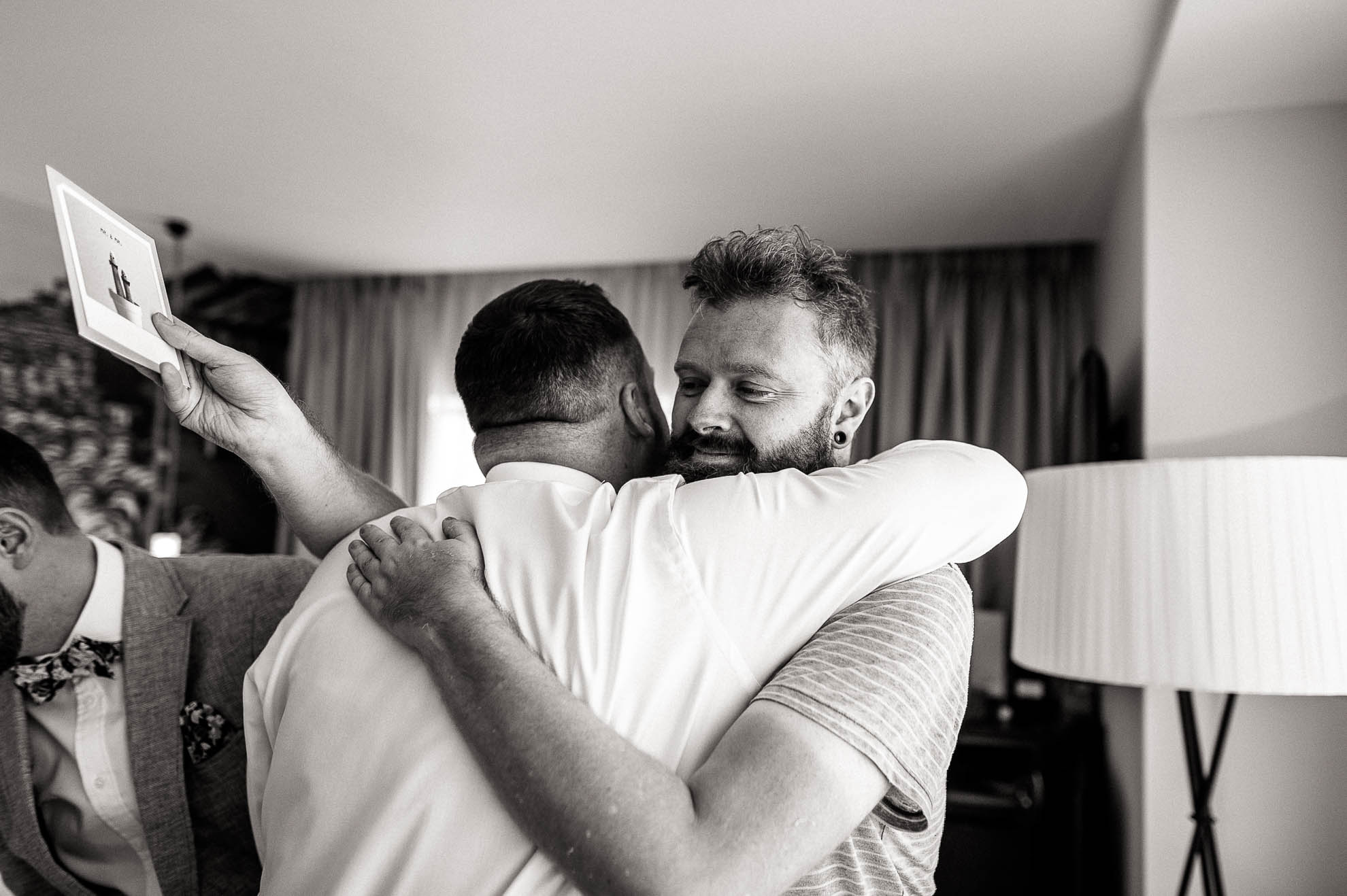 Mike hugs his friend