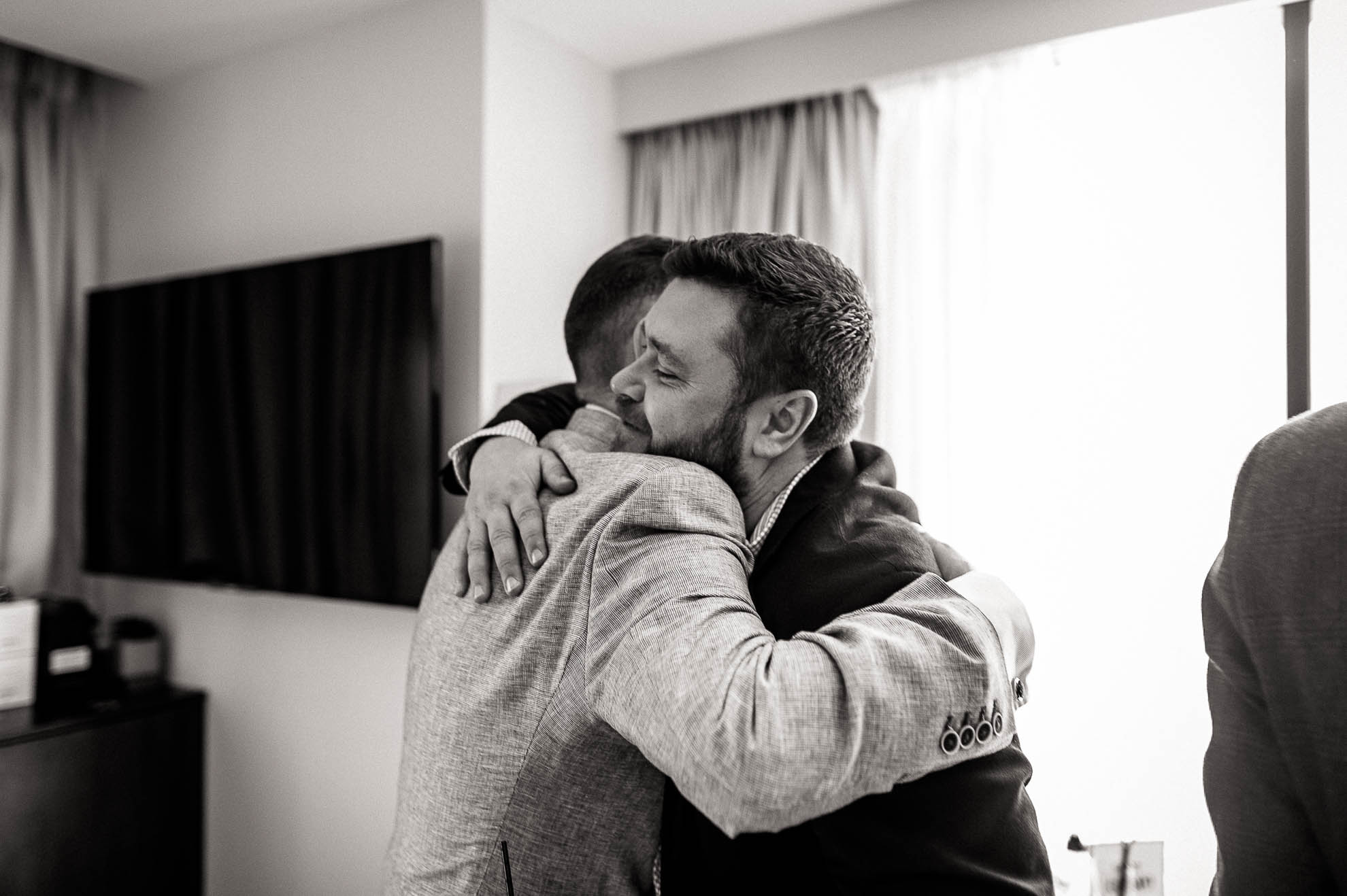 luke and friend hug