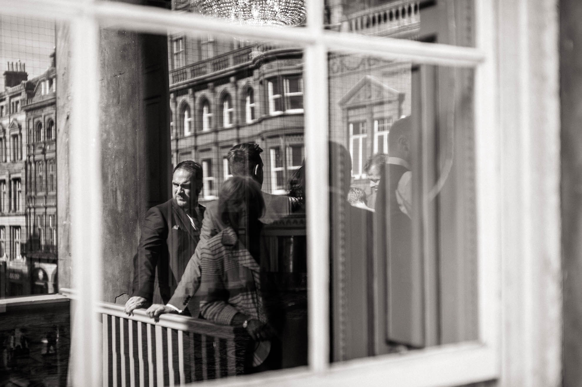 mans reflection in mirror