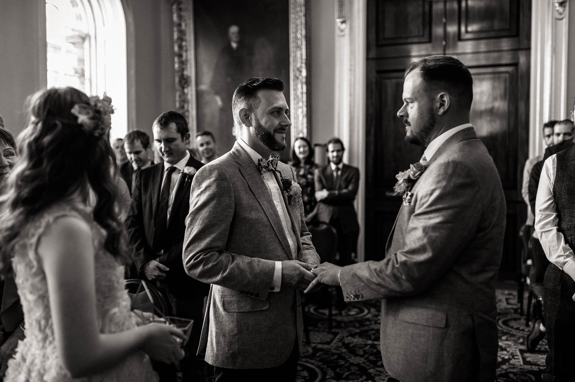 luke places a wedding ring on mike's finger