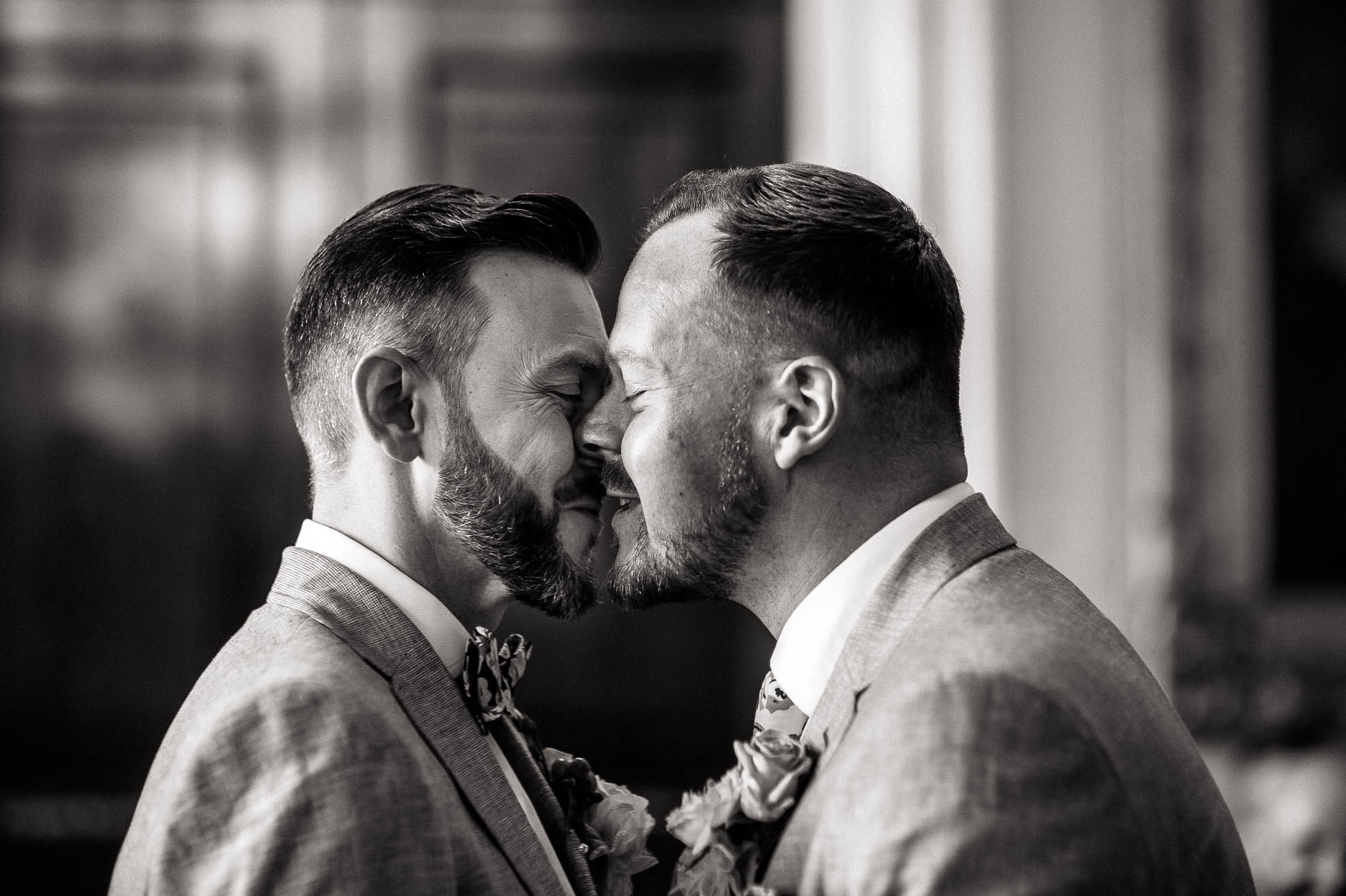 luke and mike kiss after the exchange of wedding rings