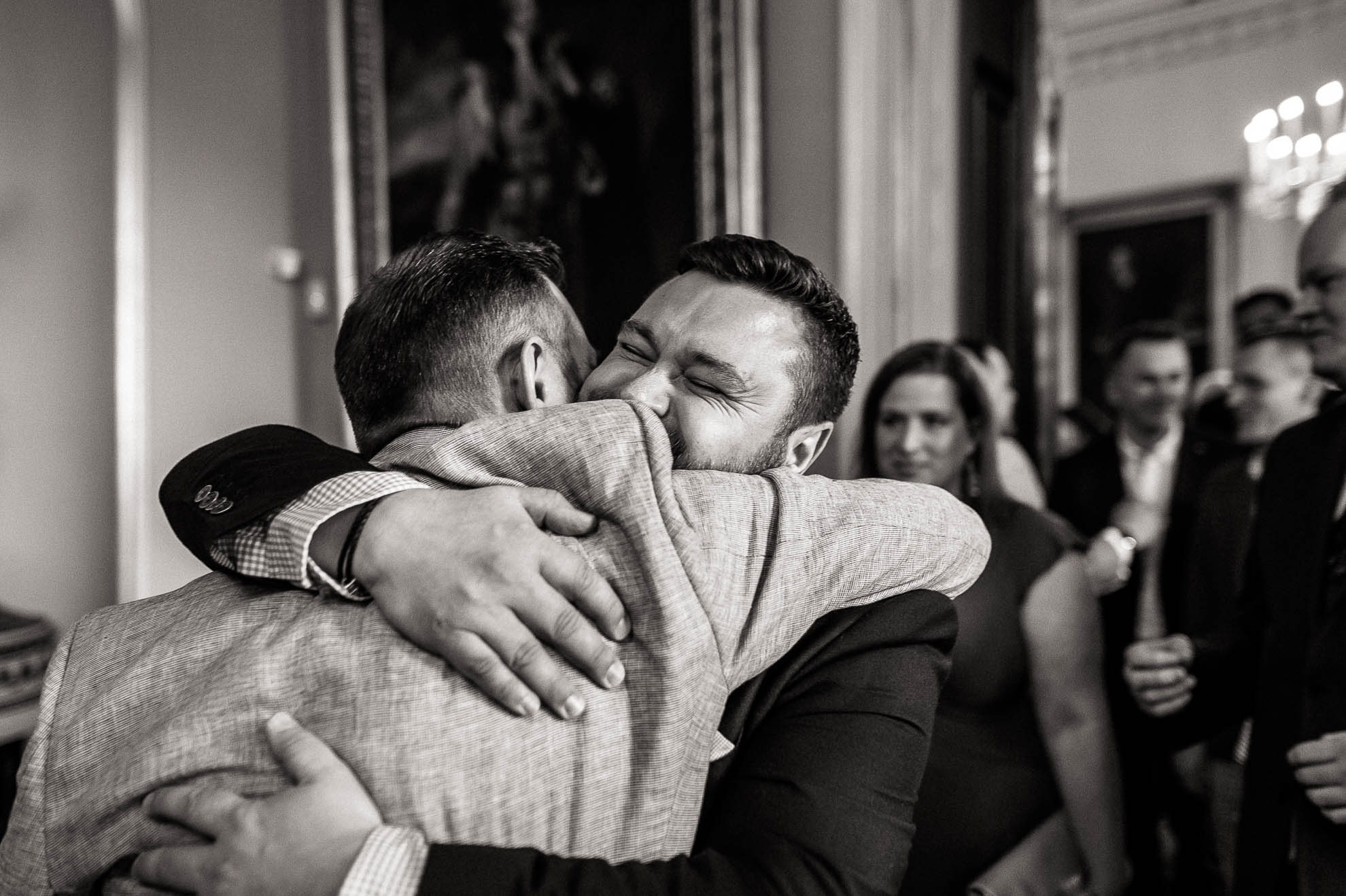 a guest hugs Luke