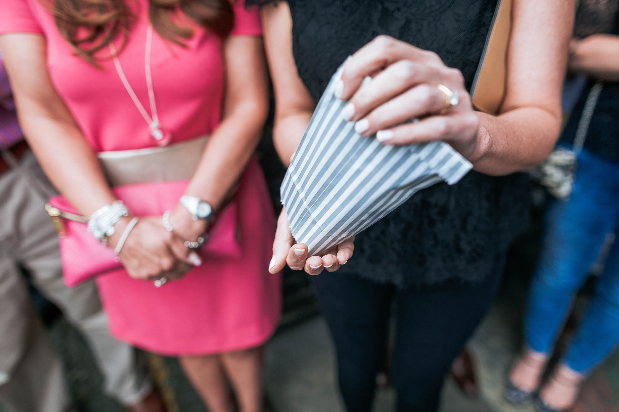 guest pours confetti into their hand