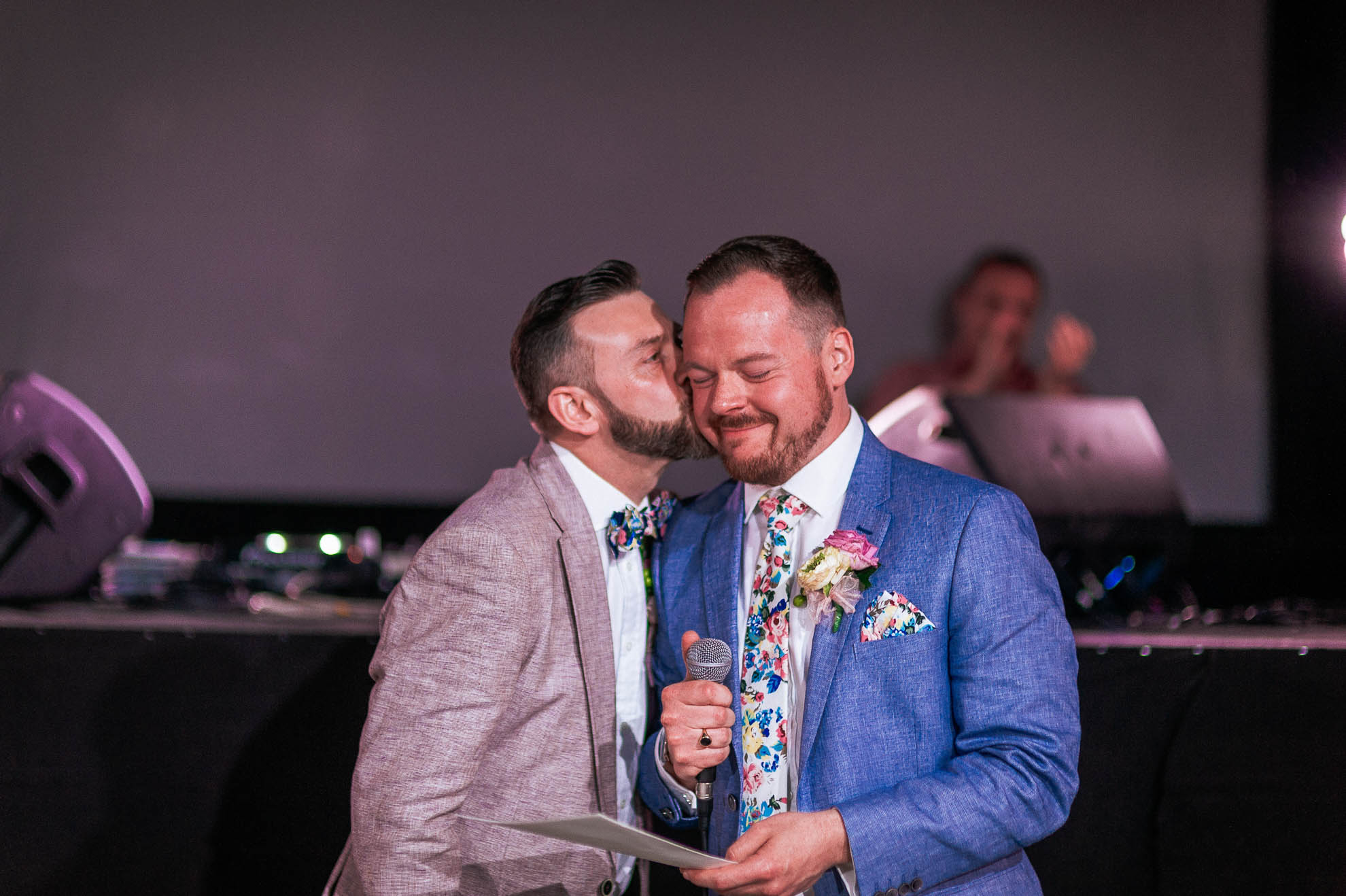 Luke give Mark a kiss on the cheek