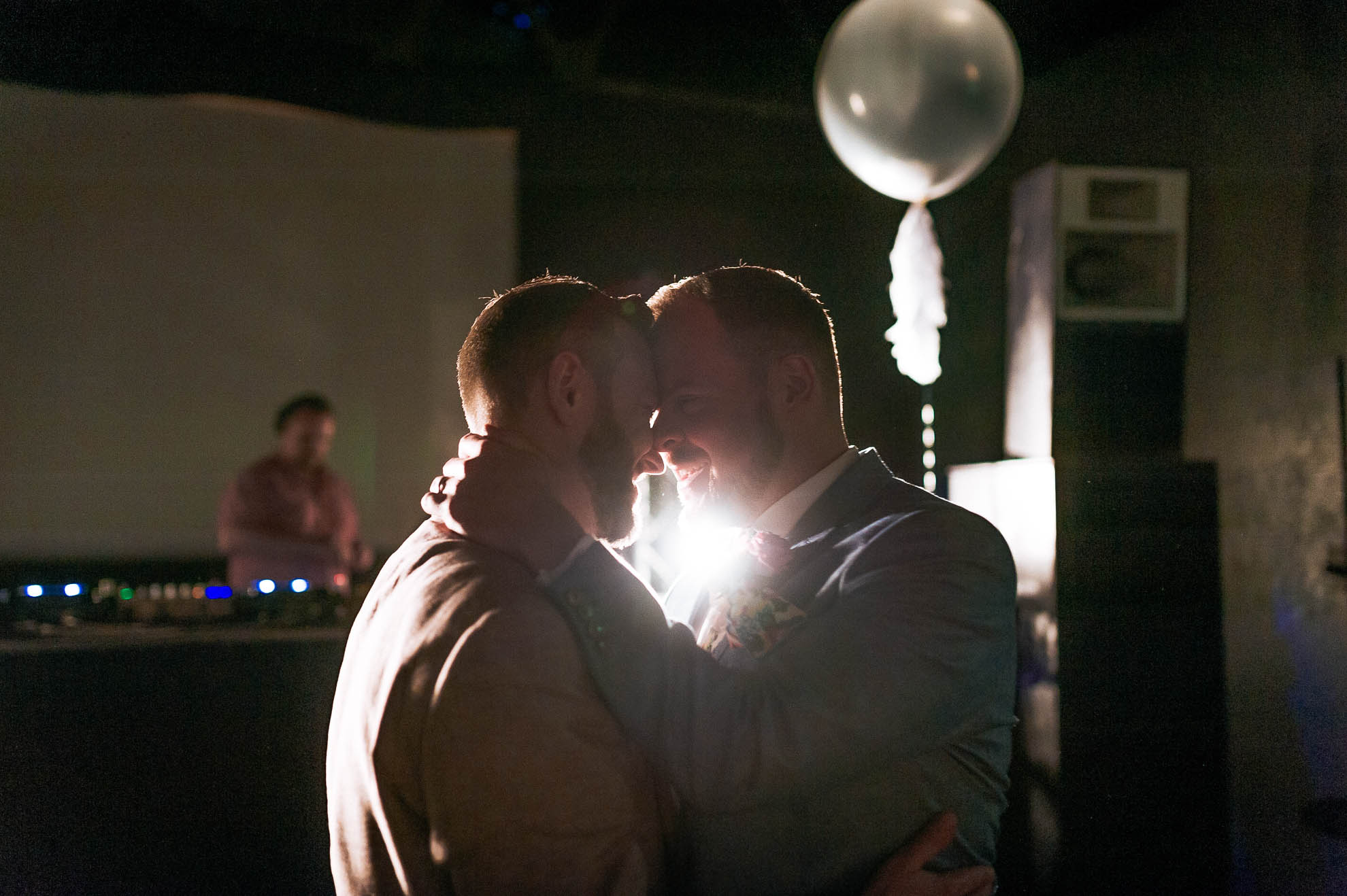 Mark & Luke touch during first dance