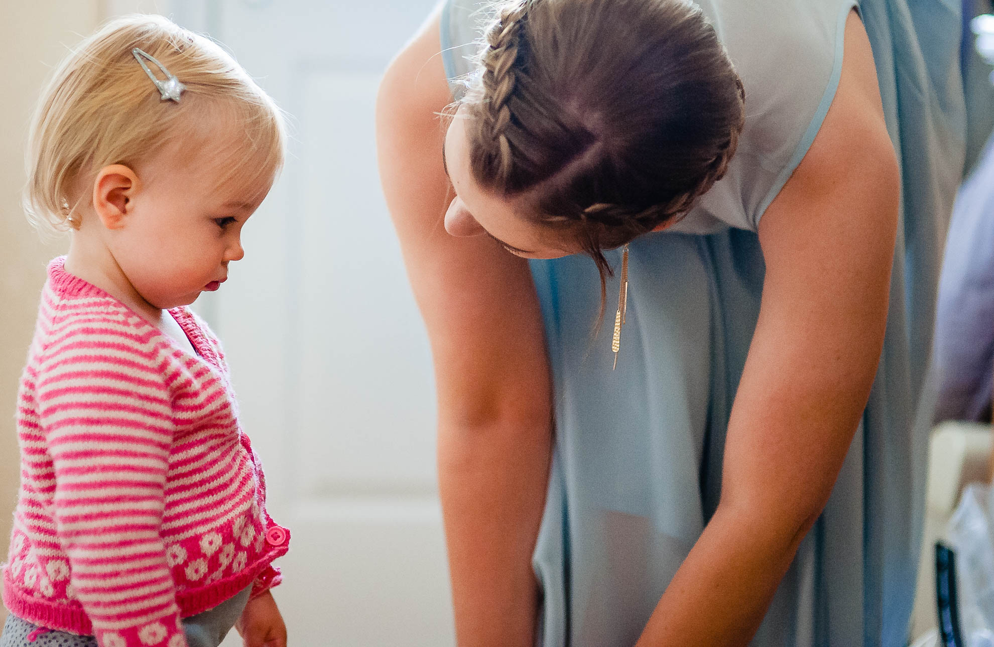 Bridesmaid talks to her daughter