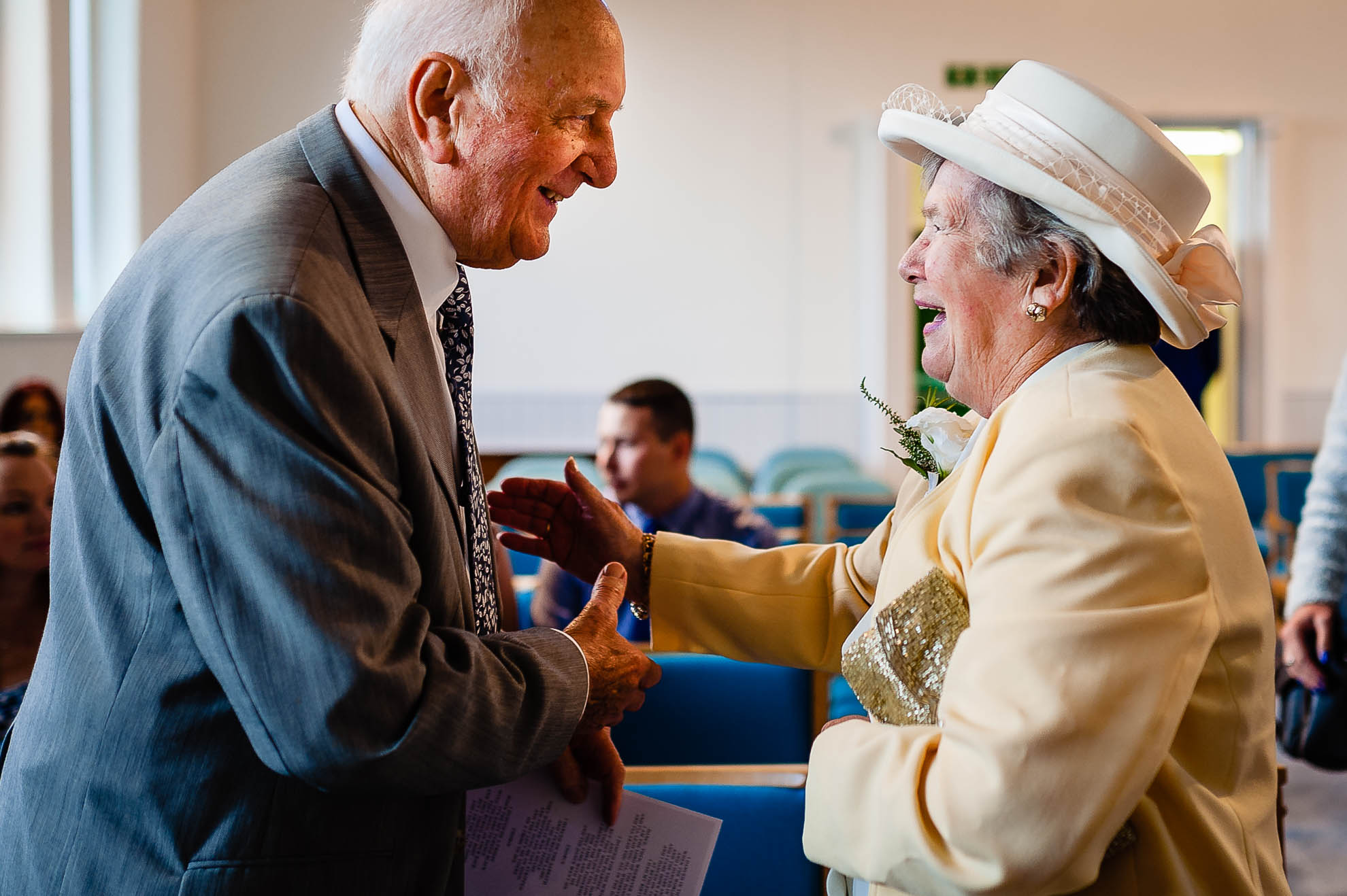 Grooms grandparents greet each other