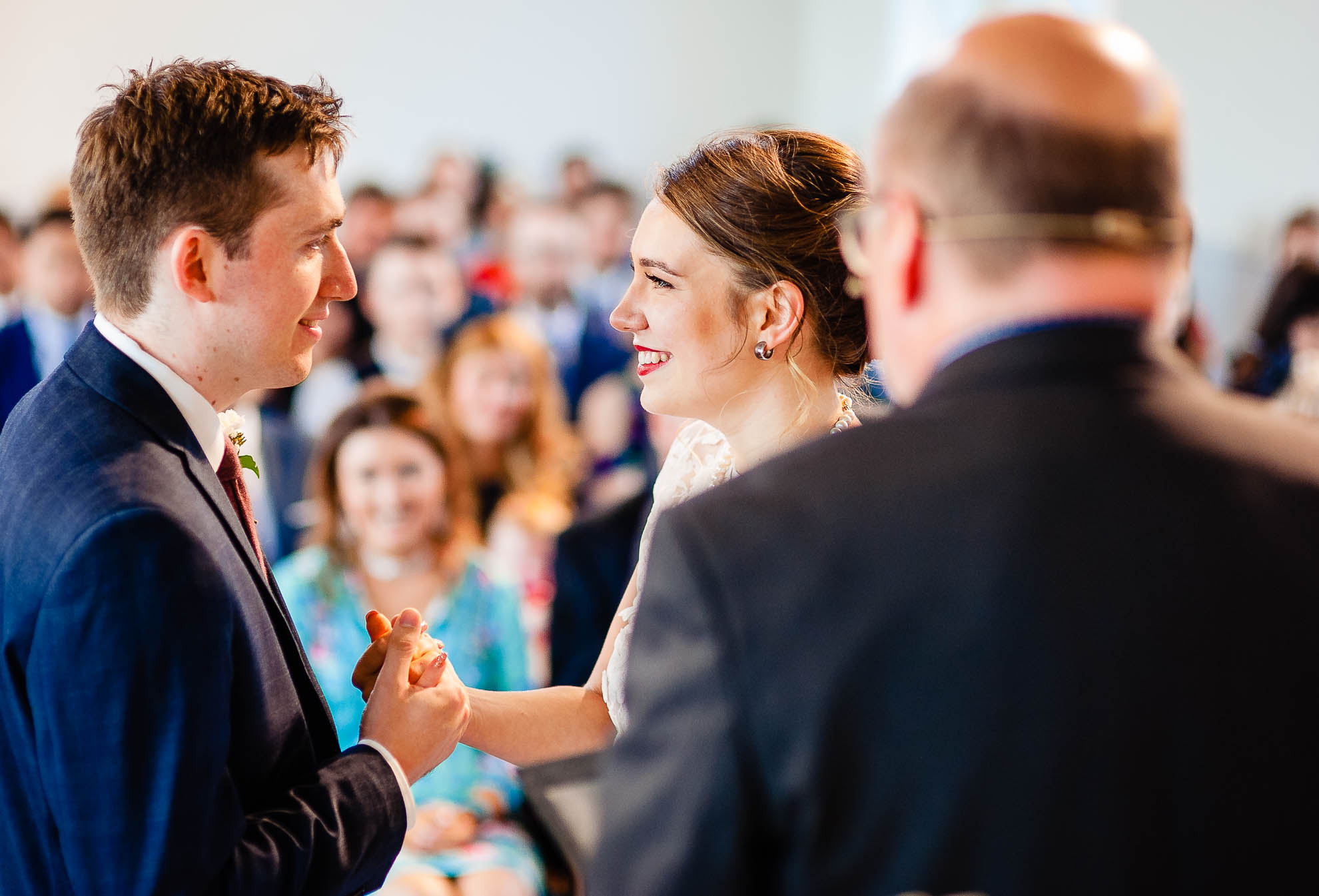 Bride and groom smile together