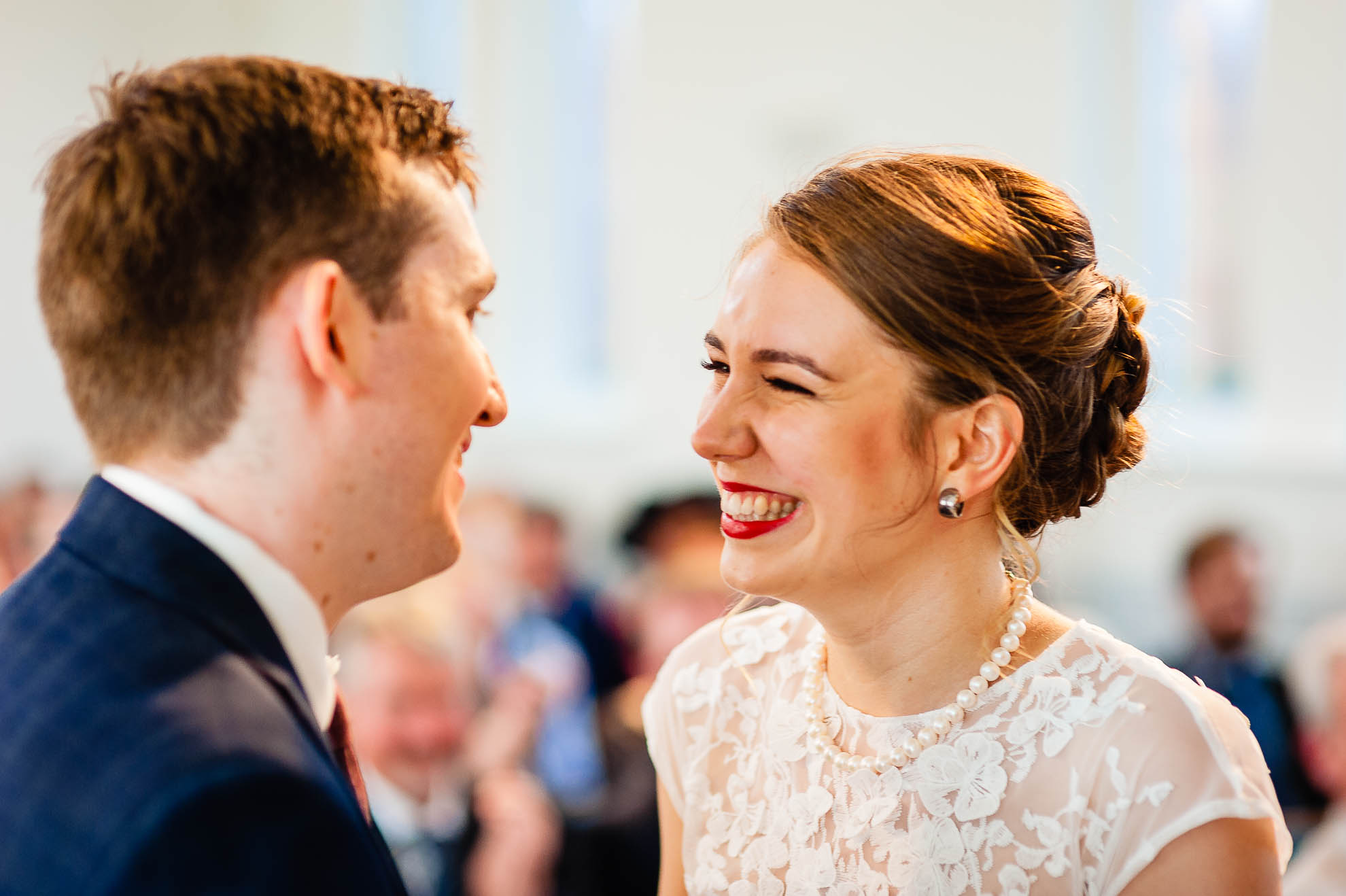 Bride and groom smile as they are announced married