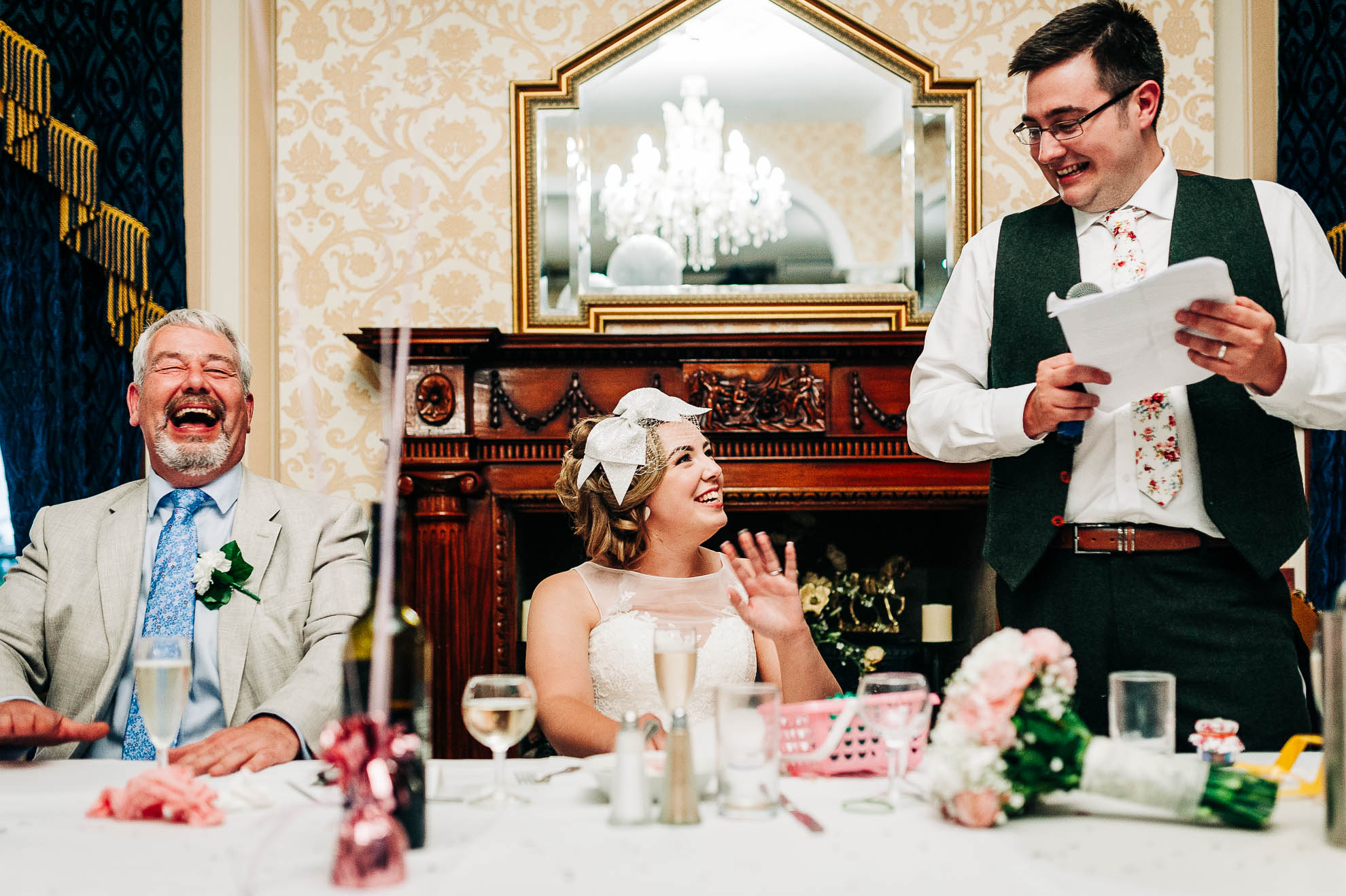 Father of the Bride laughs during the speeches