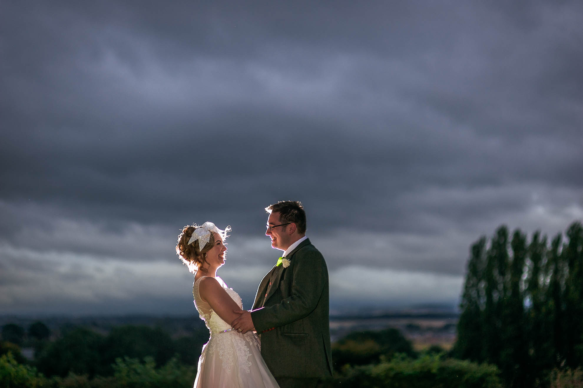 Bride and groom backlit flash portrait 