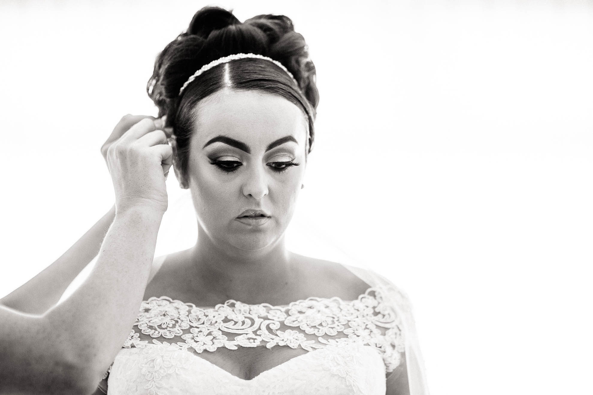 bride has hair adjusted