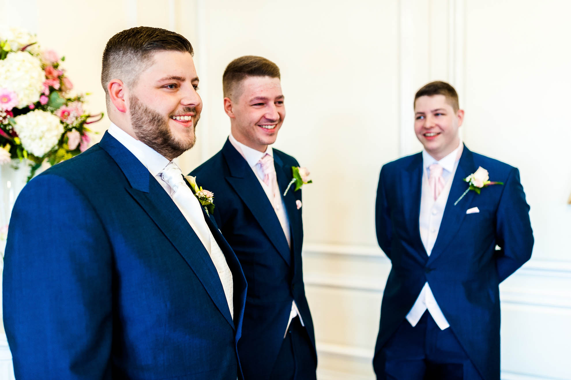 groom and ushers share a joke