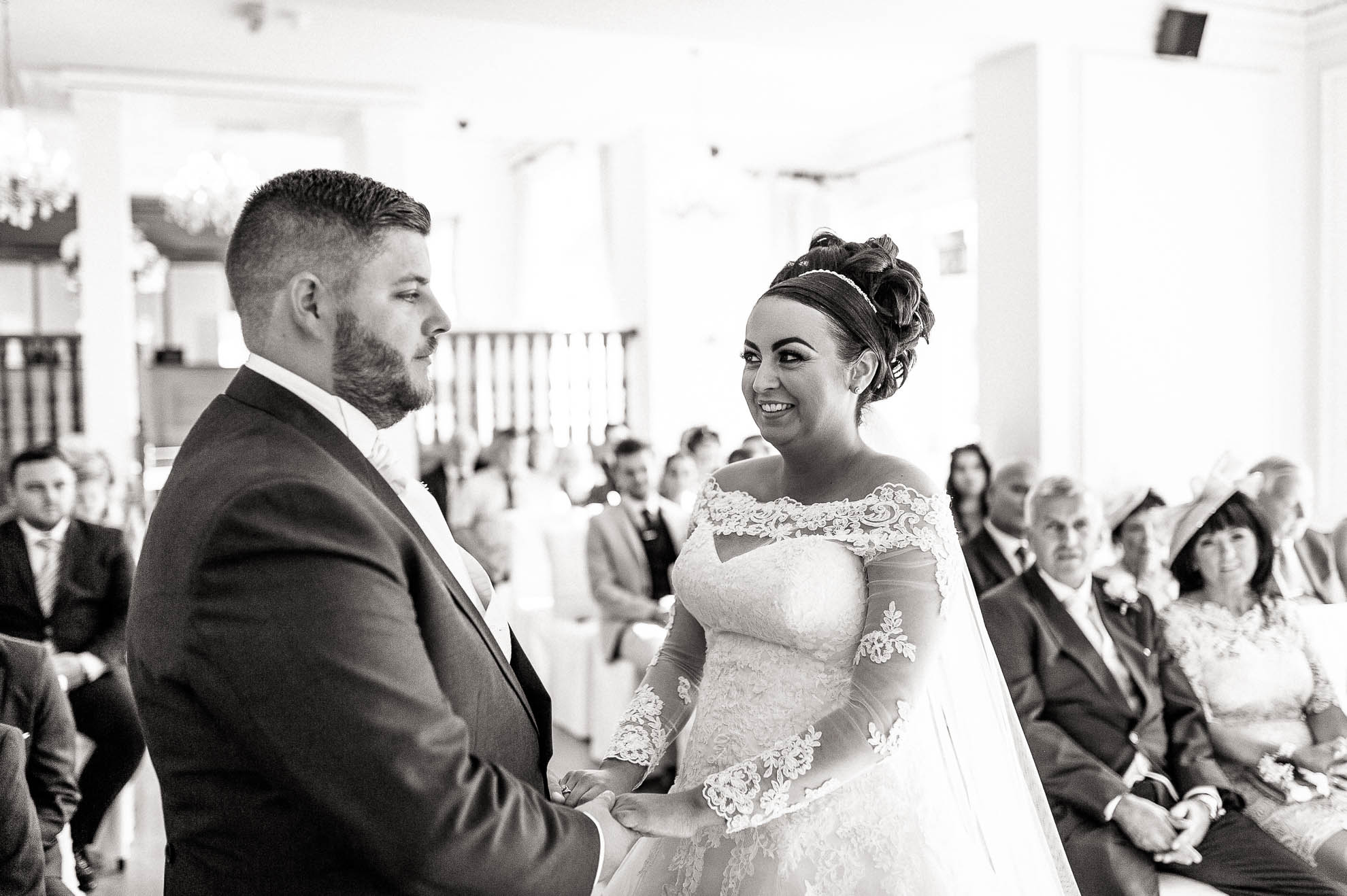 bride and groom laugh during exchange of vows