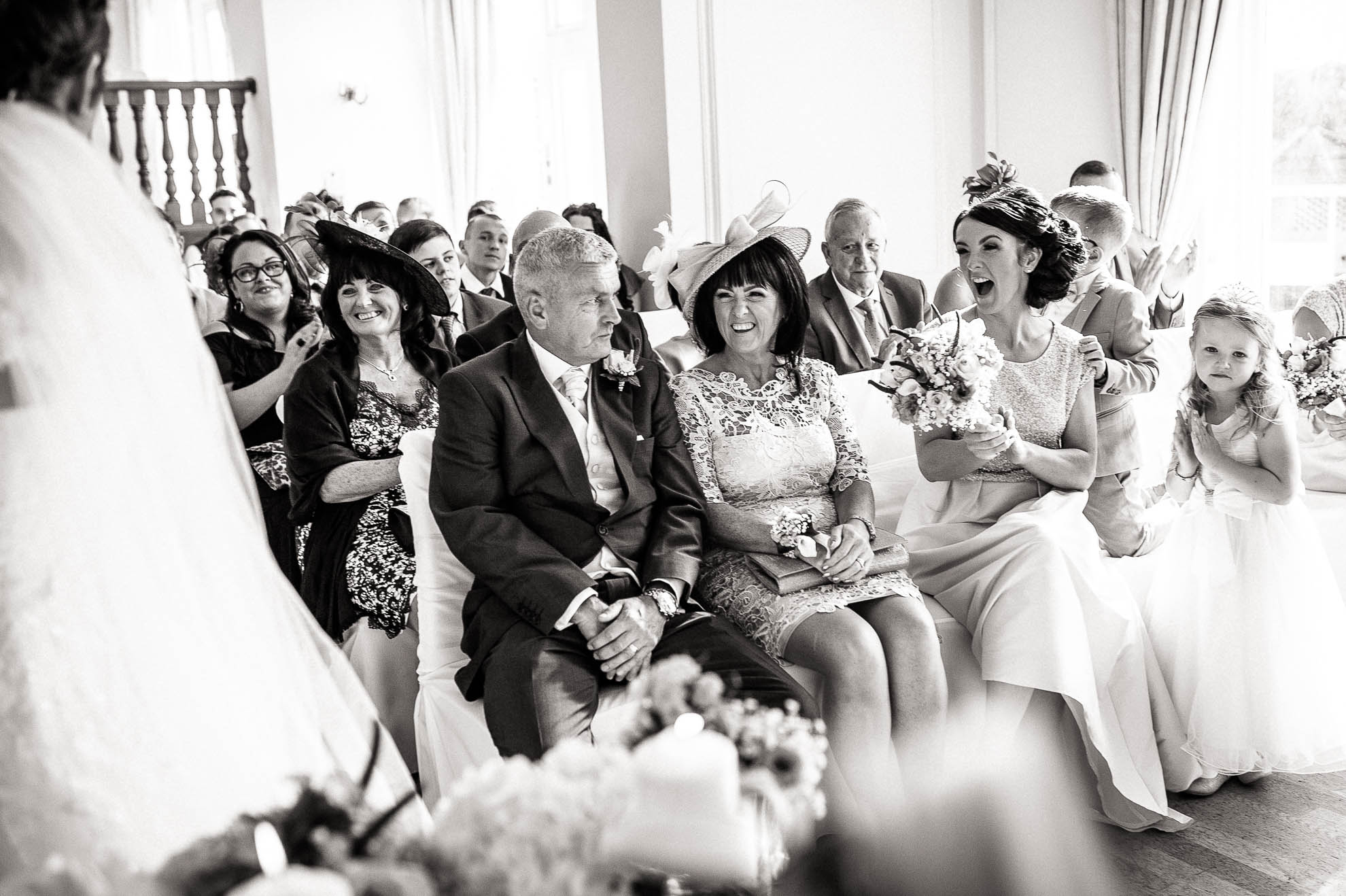 brides family cheer as they are announced husband and wife