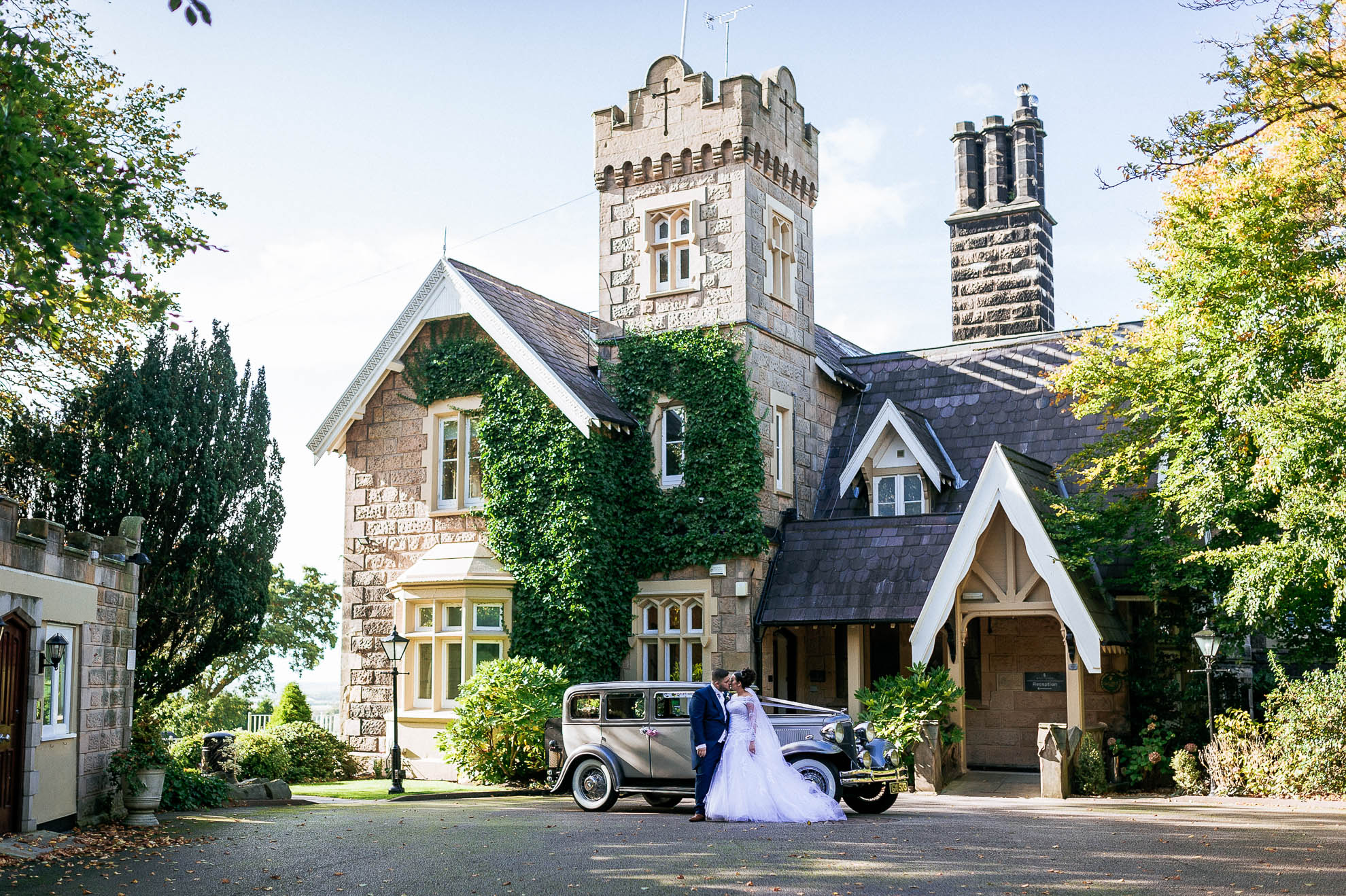 bride and groom outside West Tower