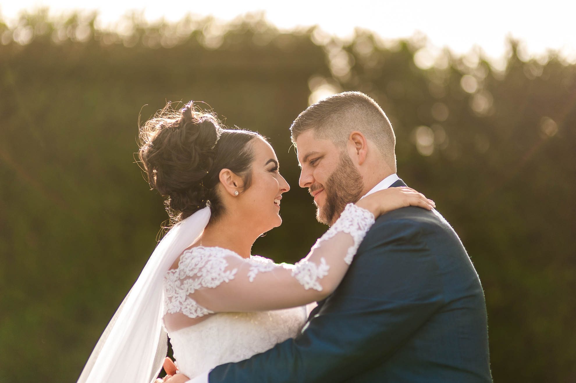 bride and groom hold each other