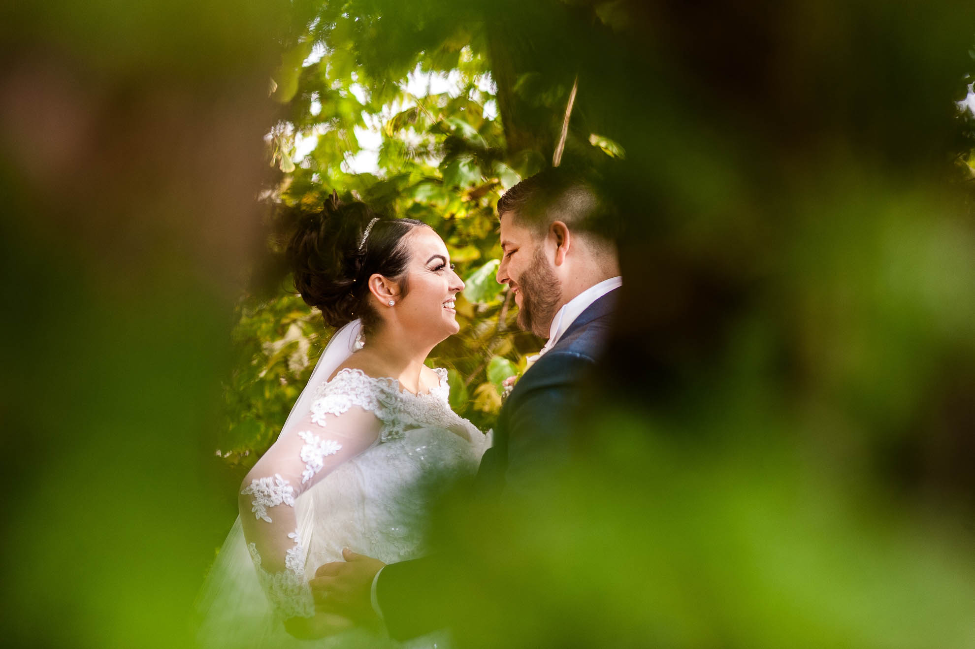 bride and groom share a joke
